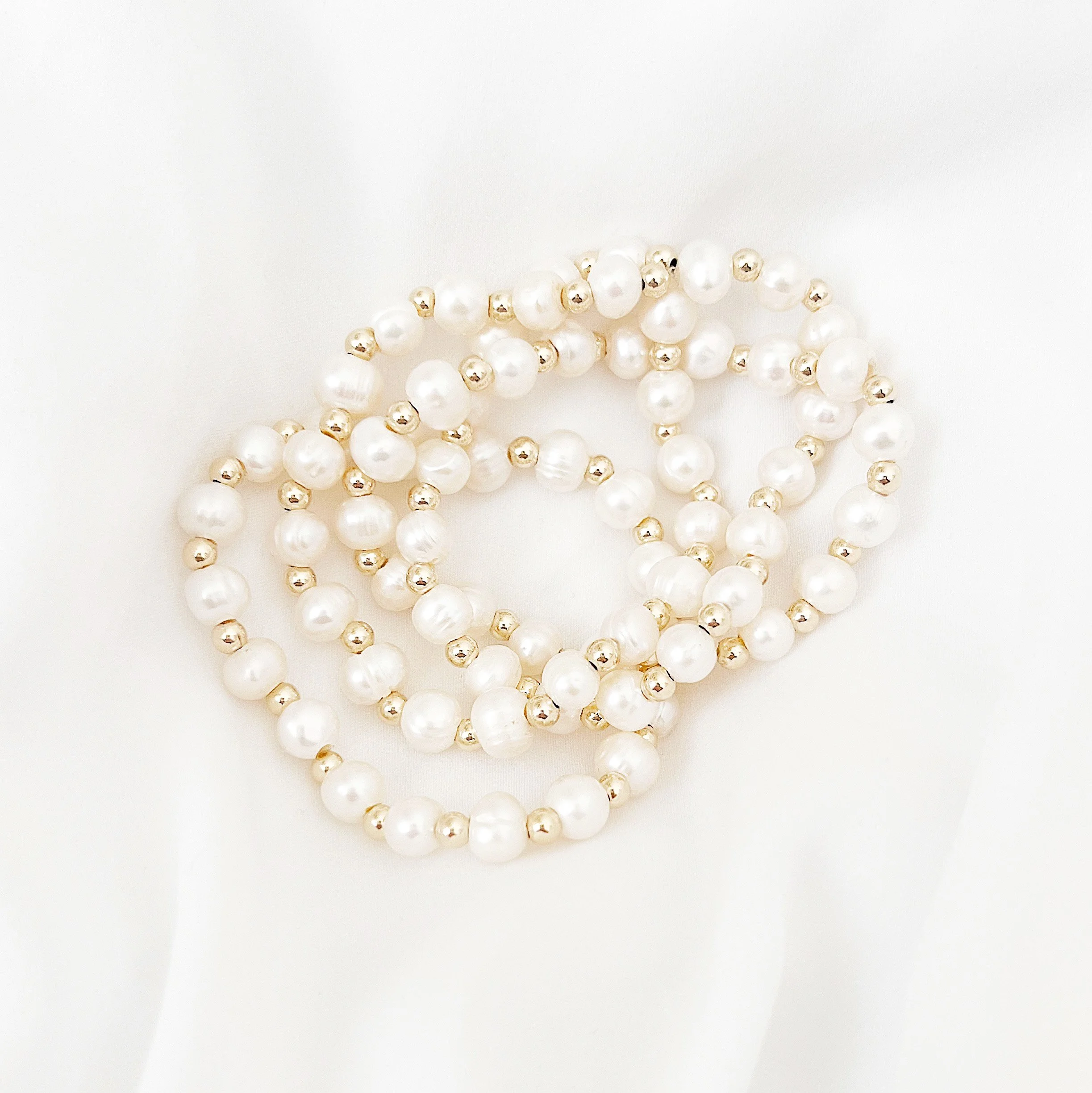 golden pearl bracelets.JPG