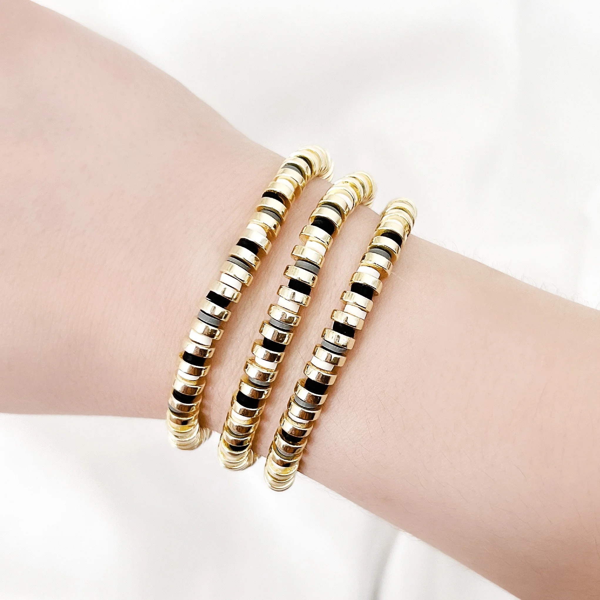 golden neutral bracelet on.JPG