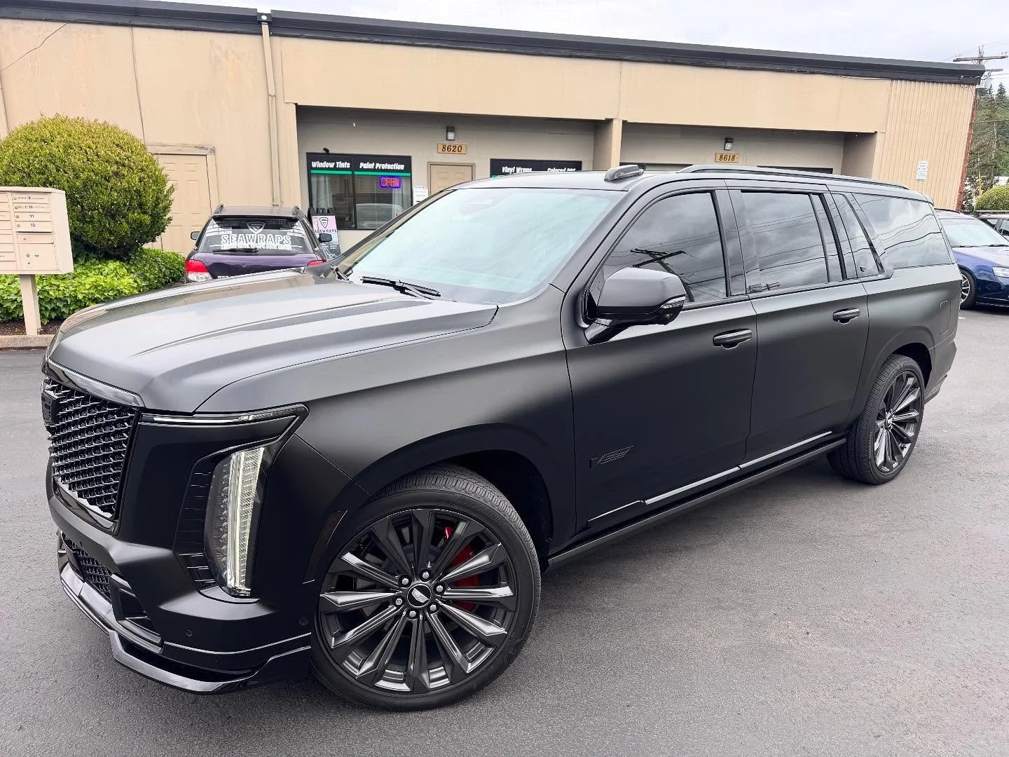 Absolutely massive job on this Massive and menacing Escalade V! This thing was insane! Went from glossy black to exposed paint to @stek.usa DYNOmatte all around! Left a few areas glossy to give it some nice contrast! Final results were stunning! Cust