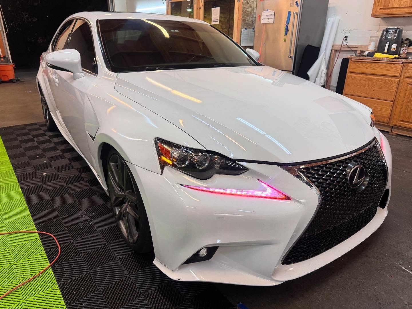 Fenders and trunk on this Lexus done in 3M Pearl White to contract with the OEM white. This went over carbon fenders and a carbon trunk. Results came out great!