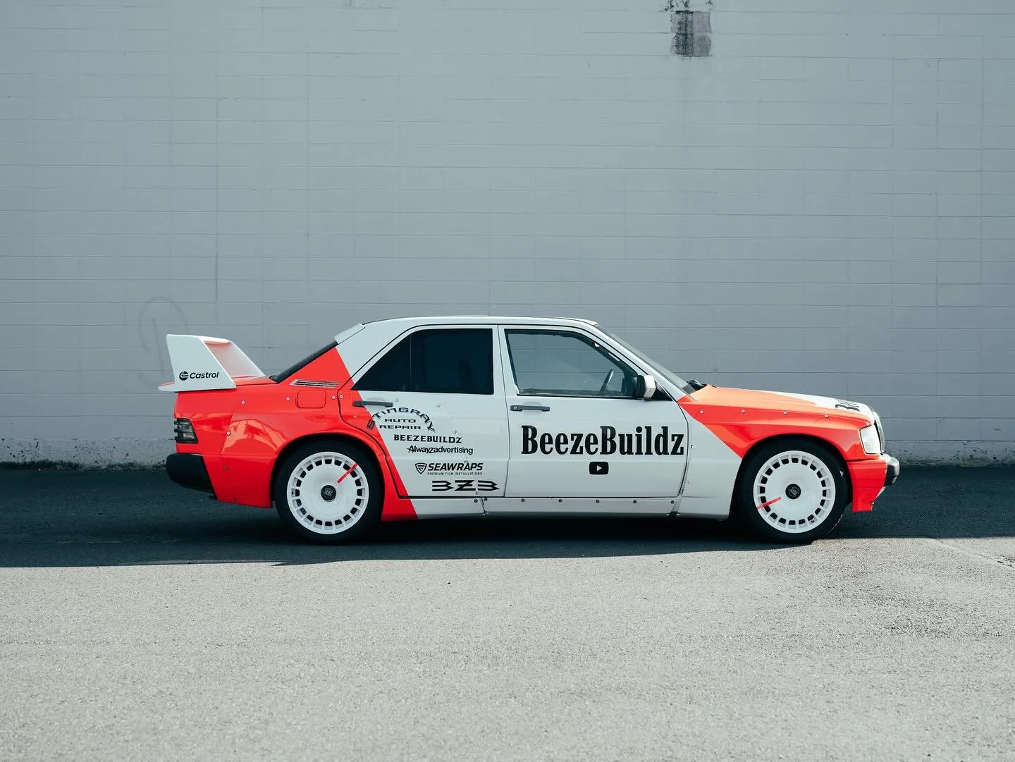 Completely custom Marlboro livery on this old school Mercedes for @beezebuildz! This was custom designed by @ardorprinting to be its own unique rendition with all associated sponsors! We used @inozetek DDE Lark Pink for the red/orange/pink color. Fin