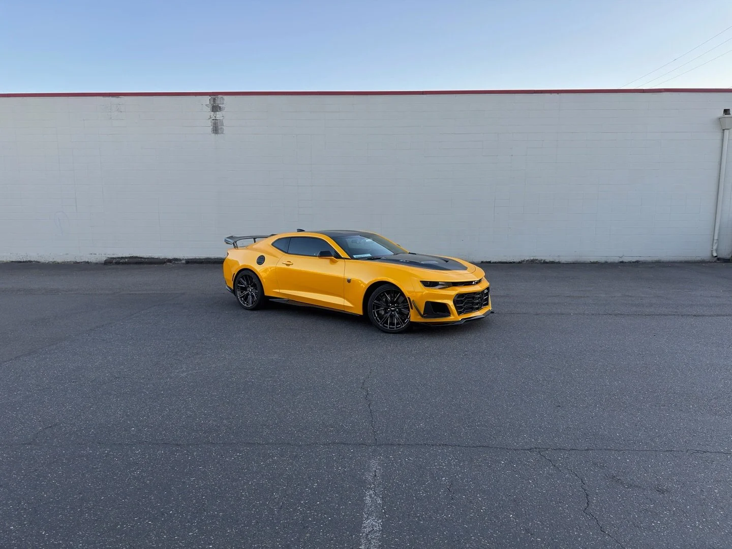 This 2017 Camaro ZL1 came in for a complete transformation. We wrapped it in @3mfilms Gloss Solar Flare PWF and added Satin Black accents using @unityppf . We also installed some aftermarket carbon fiber pieces to the front bumper. The customer wante