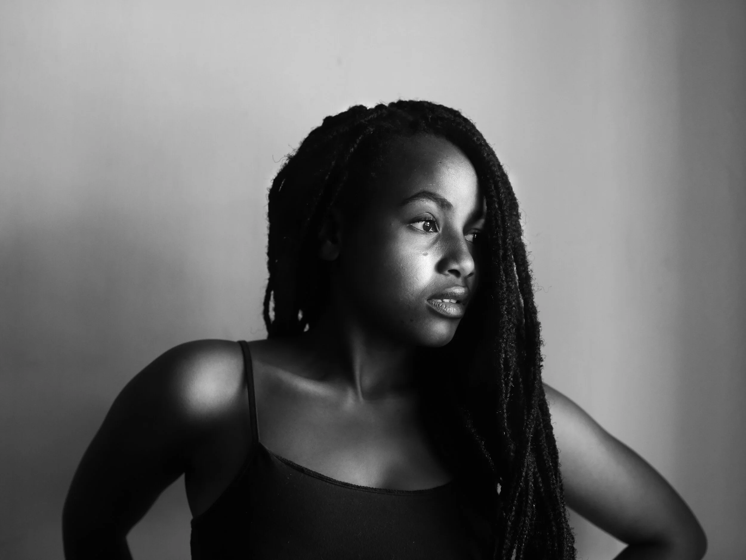 Black and white photo of black adult | anxiety symptoms in adults | therapy for young adults in San Diego, CA | depression in adults | best young adult therapist | therapy for low self esteem | San Diego, CA 92101 | La Jolla, CA 92037