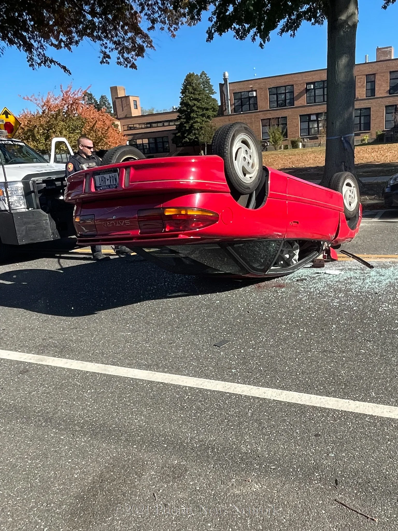 Ring Doorbell Captures Car Overturning After Striking Parked Car