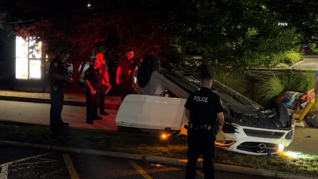 Mercedes Overturns in Baldwin KFC Drive-Thru, Driver Injured
