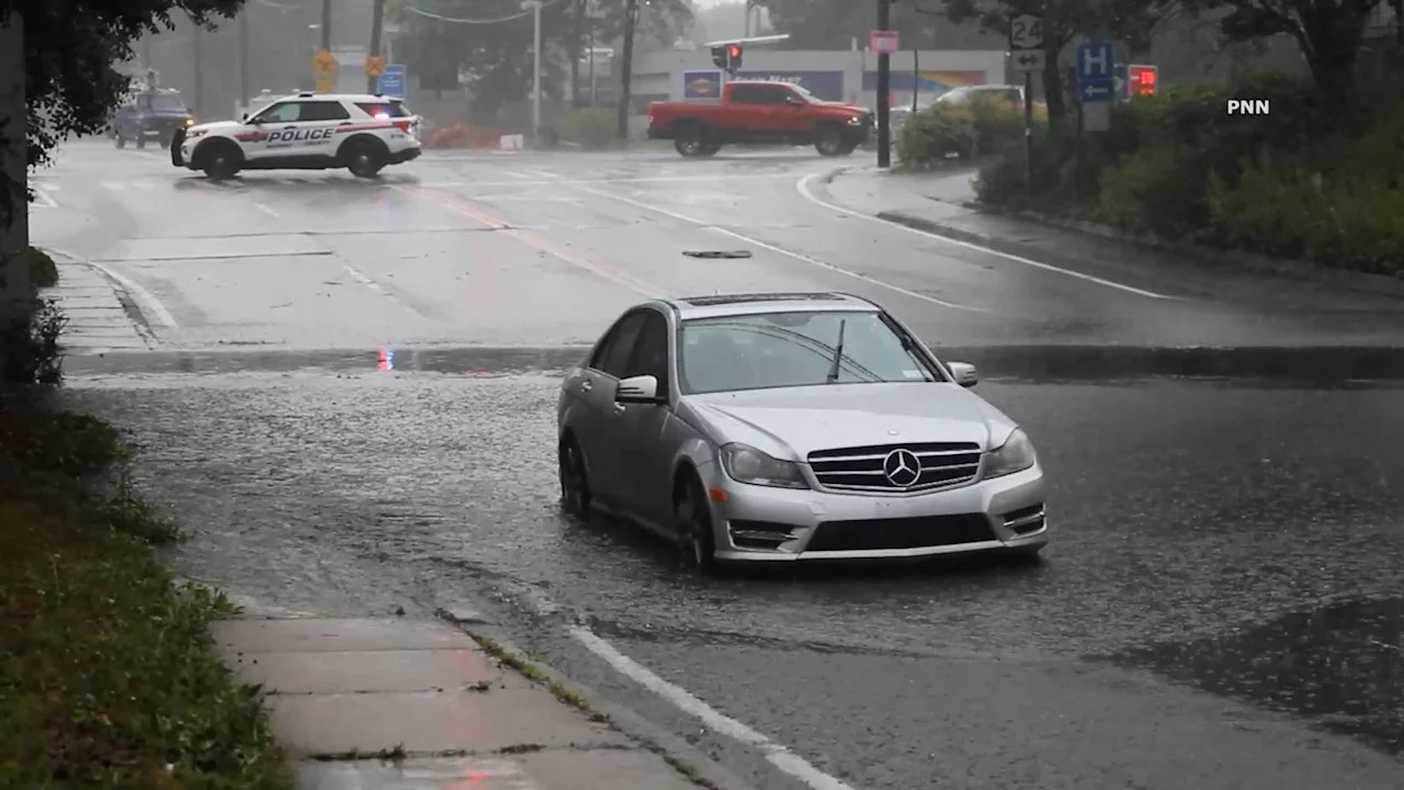 Mercedes Left Stranded After Driving Into Flooded South Farmingdale Underpass