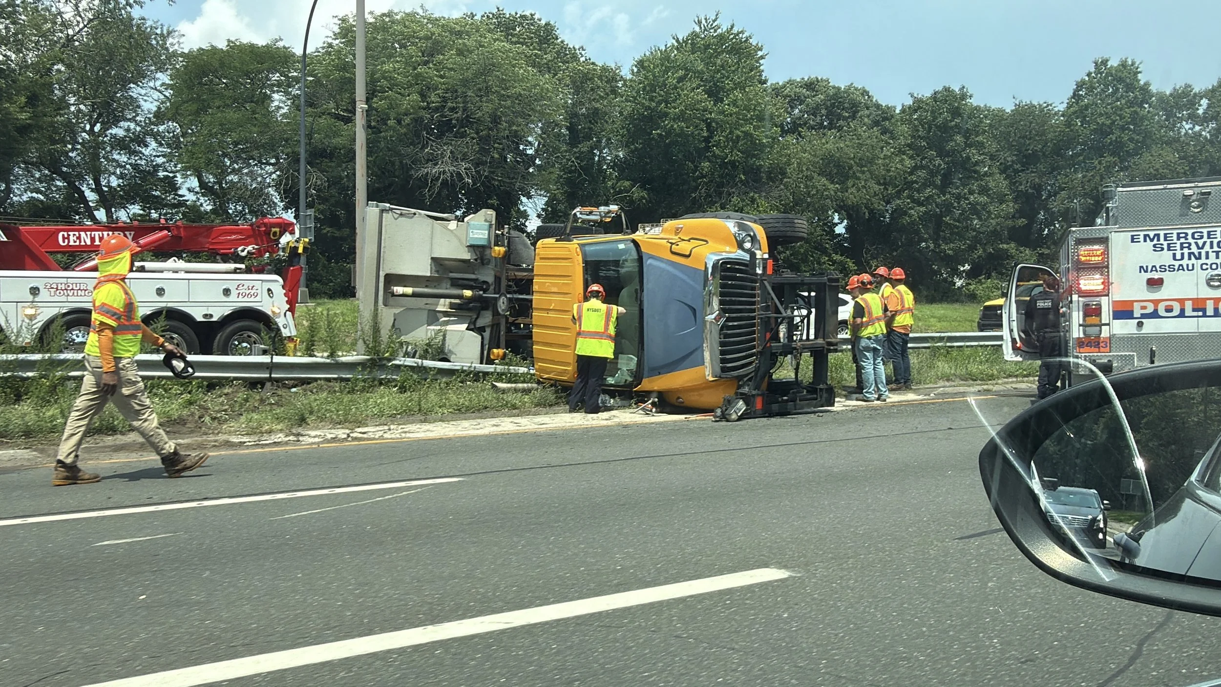 NYSDOT Truck Flips on Southern State Parkway, Crashes Through Guardrail in North Massapequa