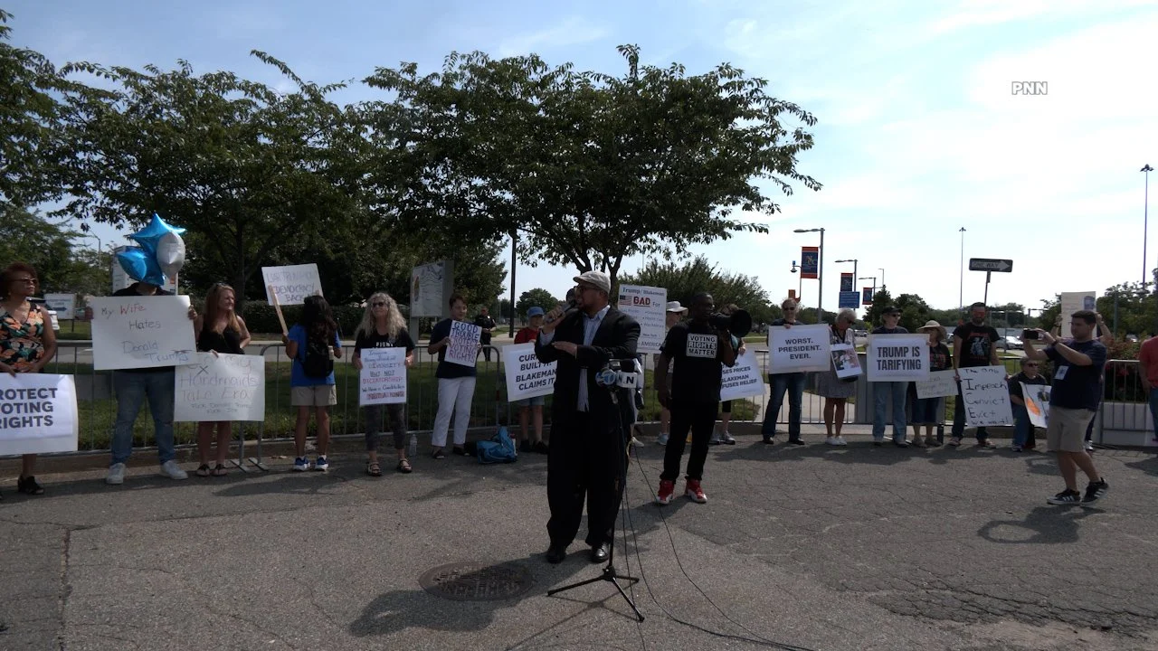 Dozens Protest Trump, Bruce Blakeman at Nassau Community College Ahead of President’s Long Island Visit