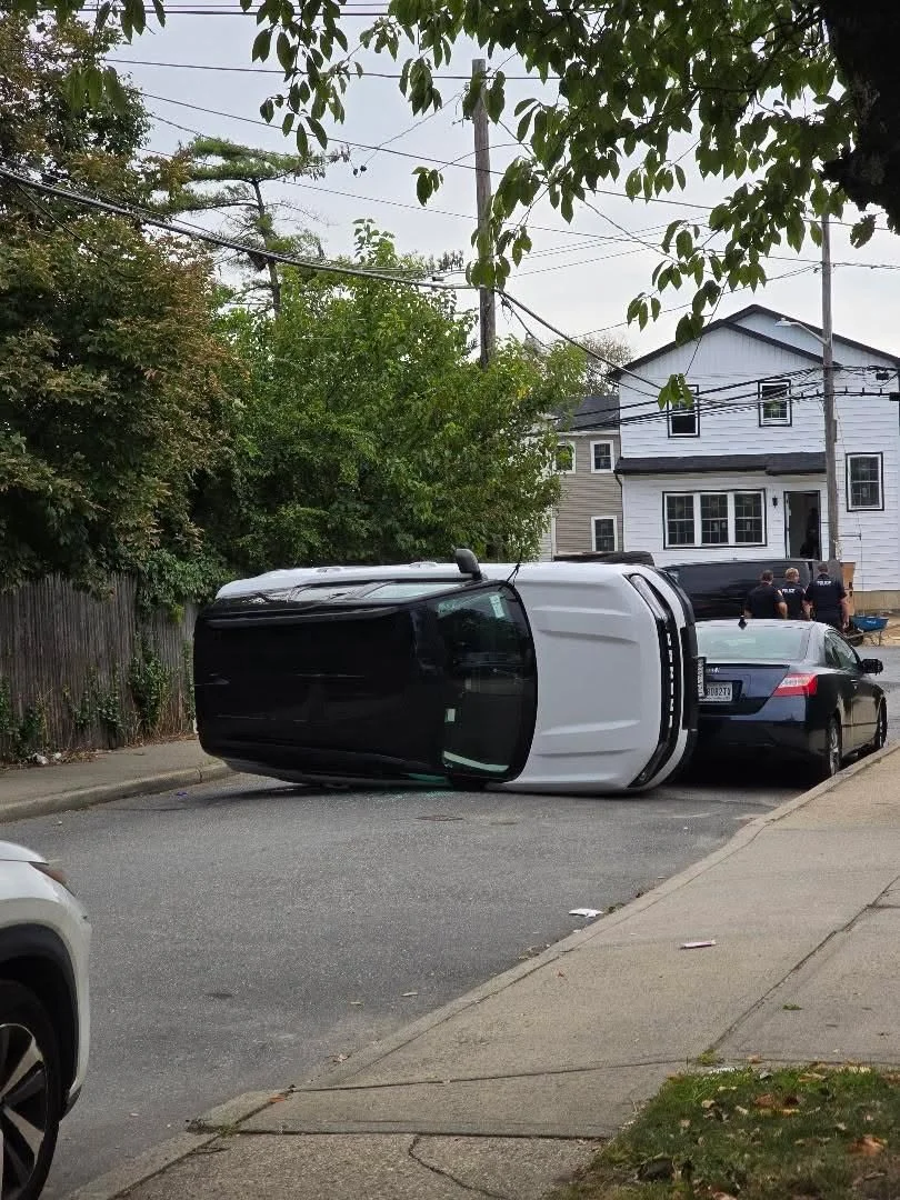 Driver Trapped After Ford Bronco Crashes Into Parked Car, Overturns in Inwood