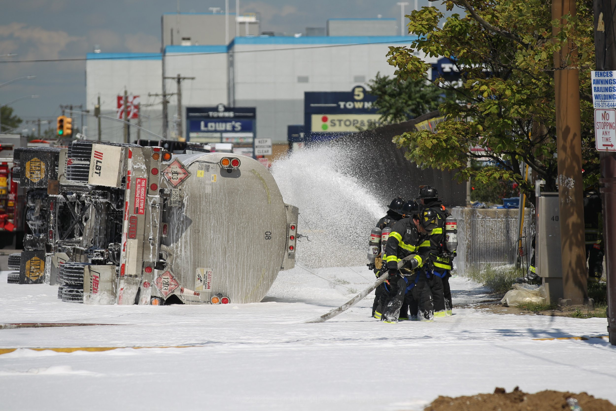 Gasoline Tanker Overturns at Nassau-Queens Border, Spilling 2,000 Gallons and Triggering Massive Response