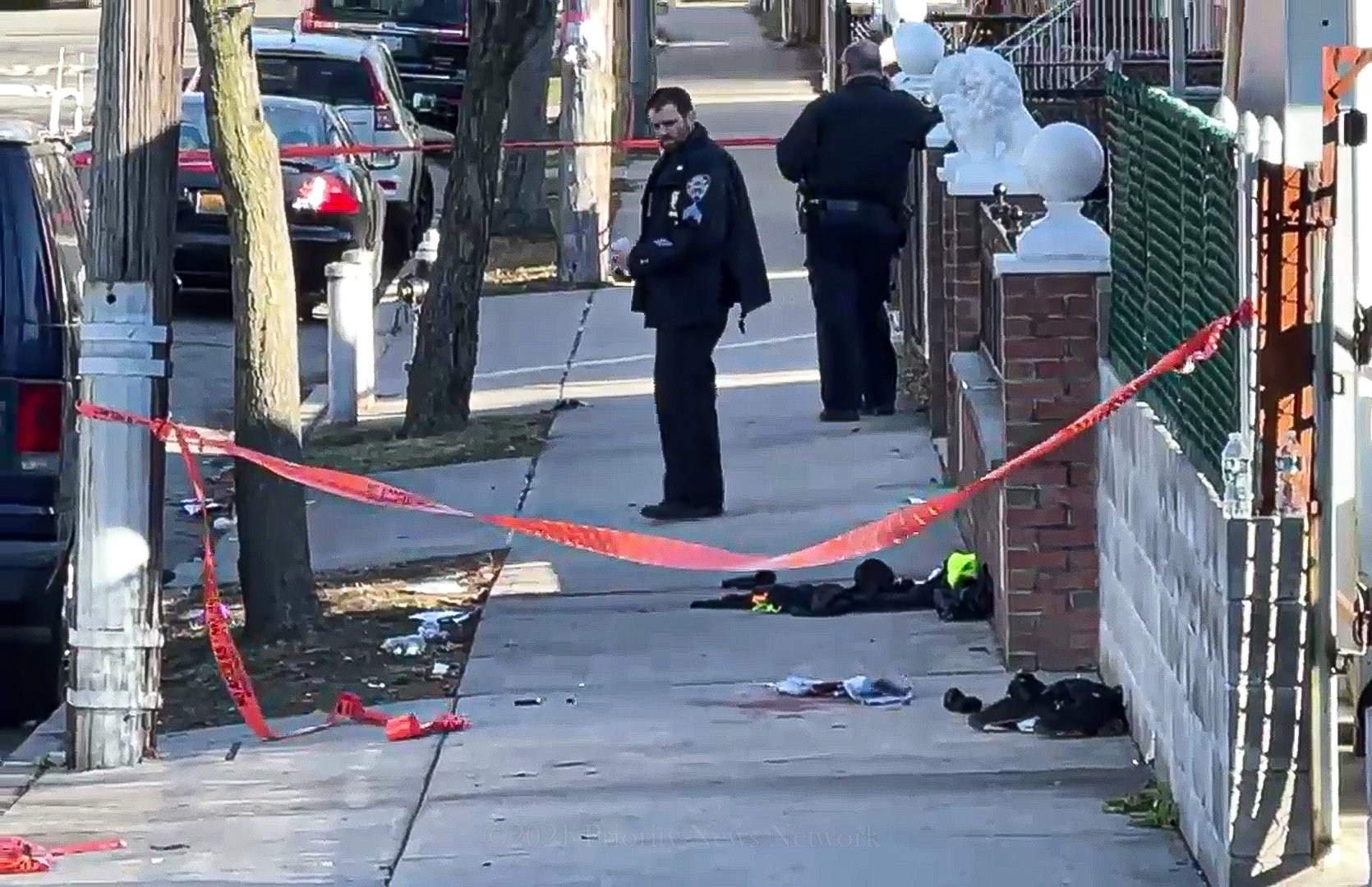 Police response to a deadly shooting in Queens