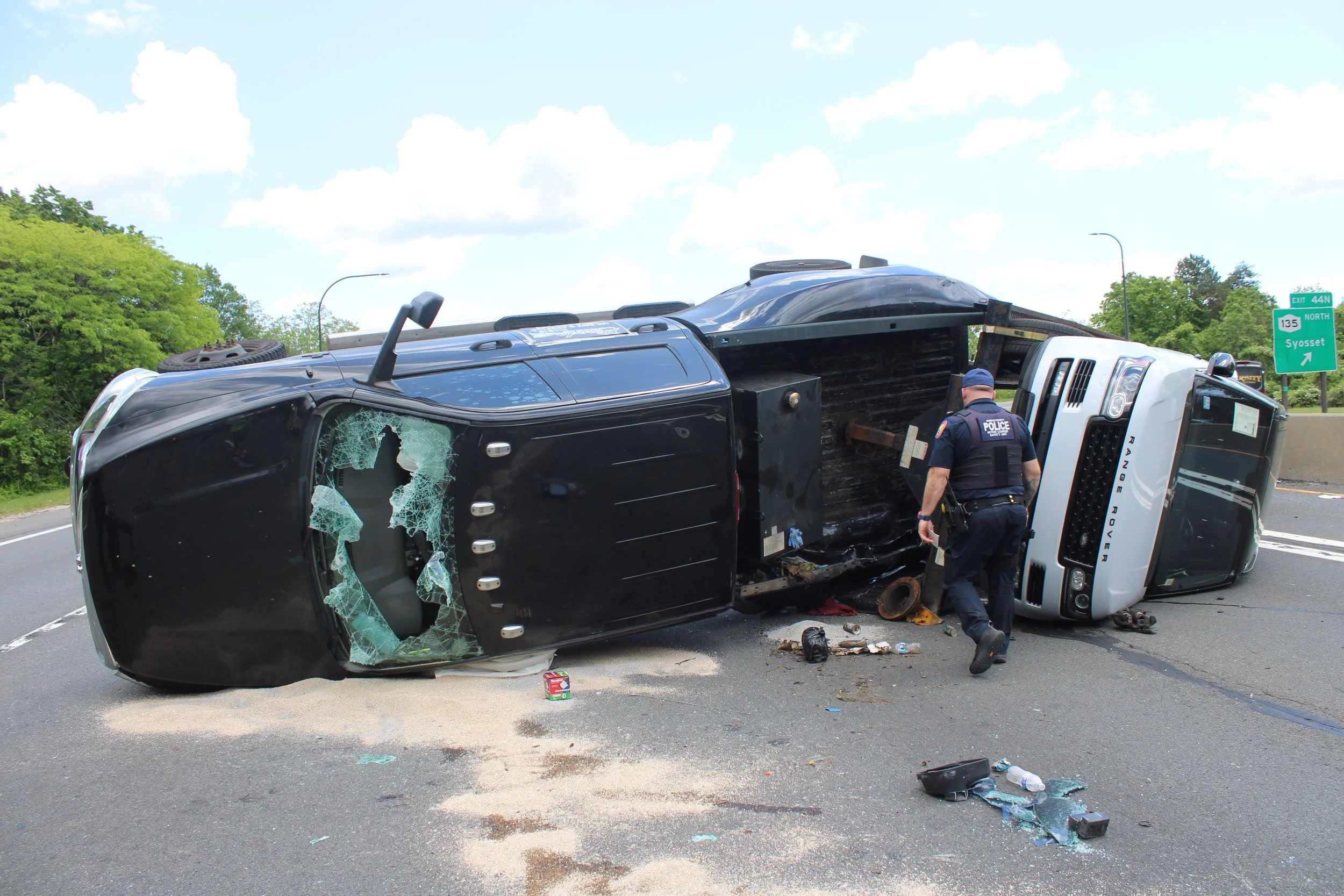 Car Carrier Overturns on LIE in Syosset, Driver Injured