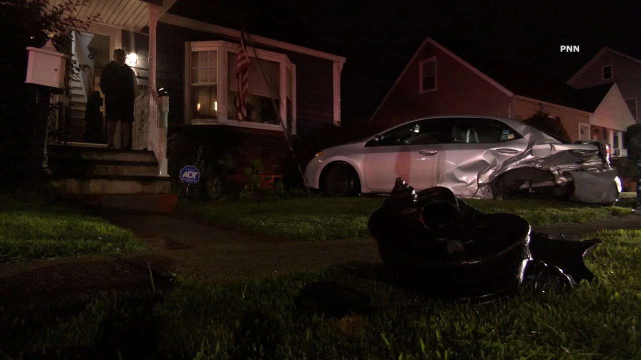 Crash Sends Parked Vehicle Onto Lawn, Narrowly Missing East Meadow House