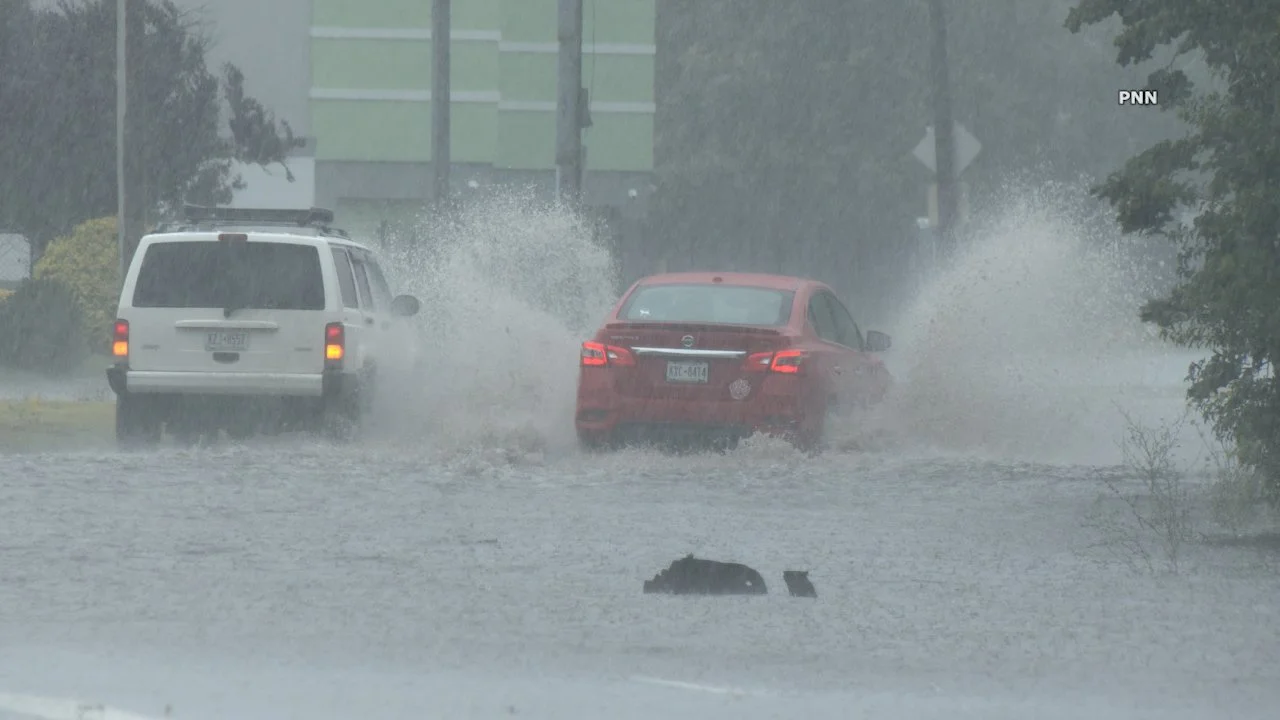 Flooded Bethpage Intersection Leaves Multiple Vehicles Disabled Amid Torrential Rain