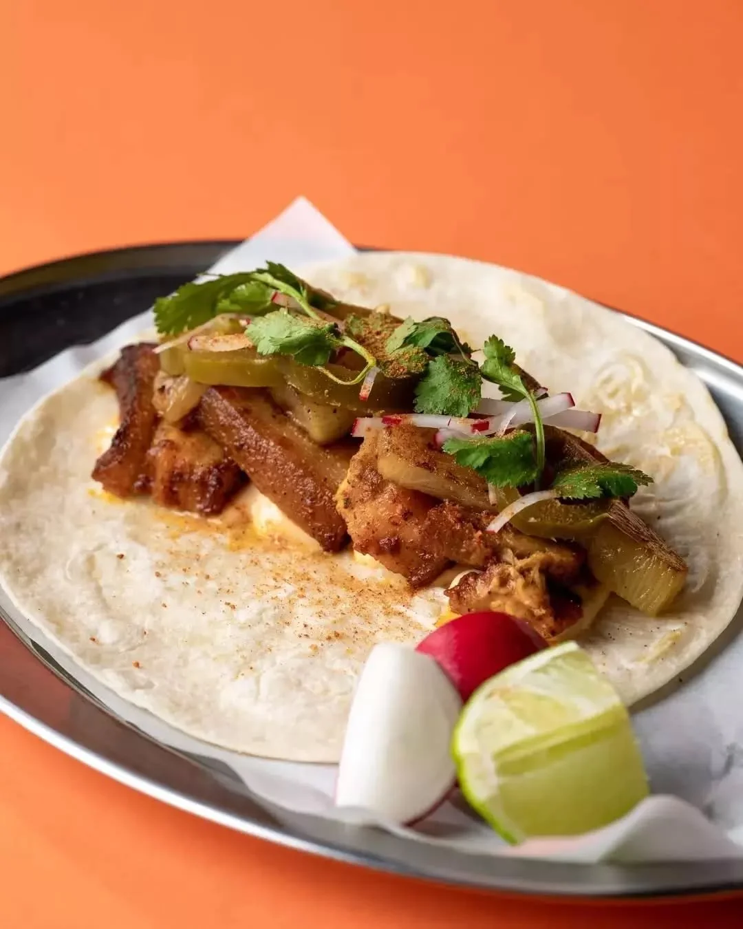 Lil Pork 🐷✨ Roast pork belly, grilled pineapple, pickled cabbage, pico de gallo &mdash; sweet, tangy, and full of flavour.