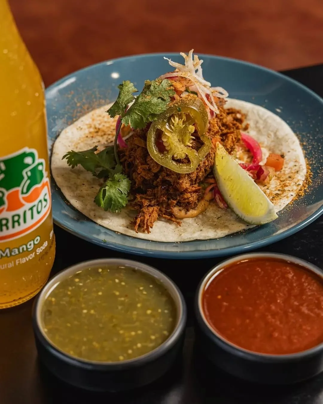 Big flavour, little taco. 🌮🔥
Our Lil Beef Taco packs adobo-marinated beef, tangy pickled cabbage, creamy guacamole, fresh pico de gallo, and smoky salsa roja into every bite. Perfectly balanced, perfectly shareable&hellip; or not. 😉