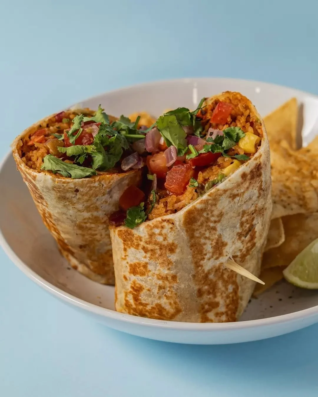 There is an inherent harmony in a well built burrito. Earthy spices, savoury meat, subtle sweetness from rice and the softness of the tortilla combine to create richness without heaviness.