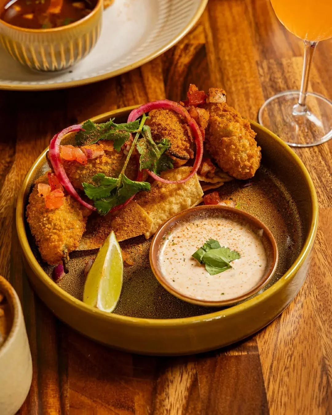 Warning: these don&rsquo;t last long.
Jalape&ntilde;o poppers stuffed with cheese, fried golden, and dunked in house ranch. Spicy, crispy, gone in seconds.