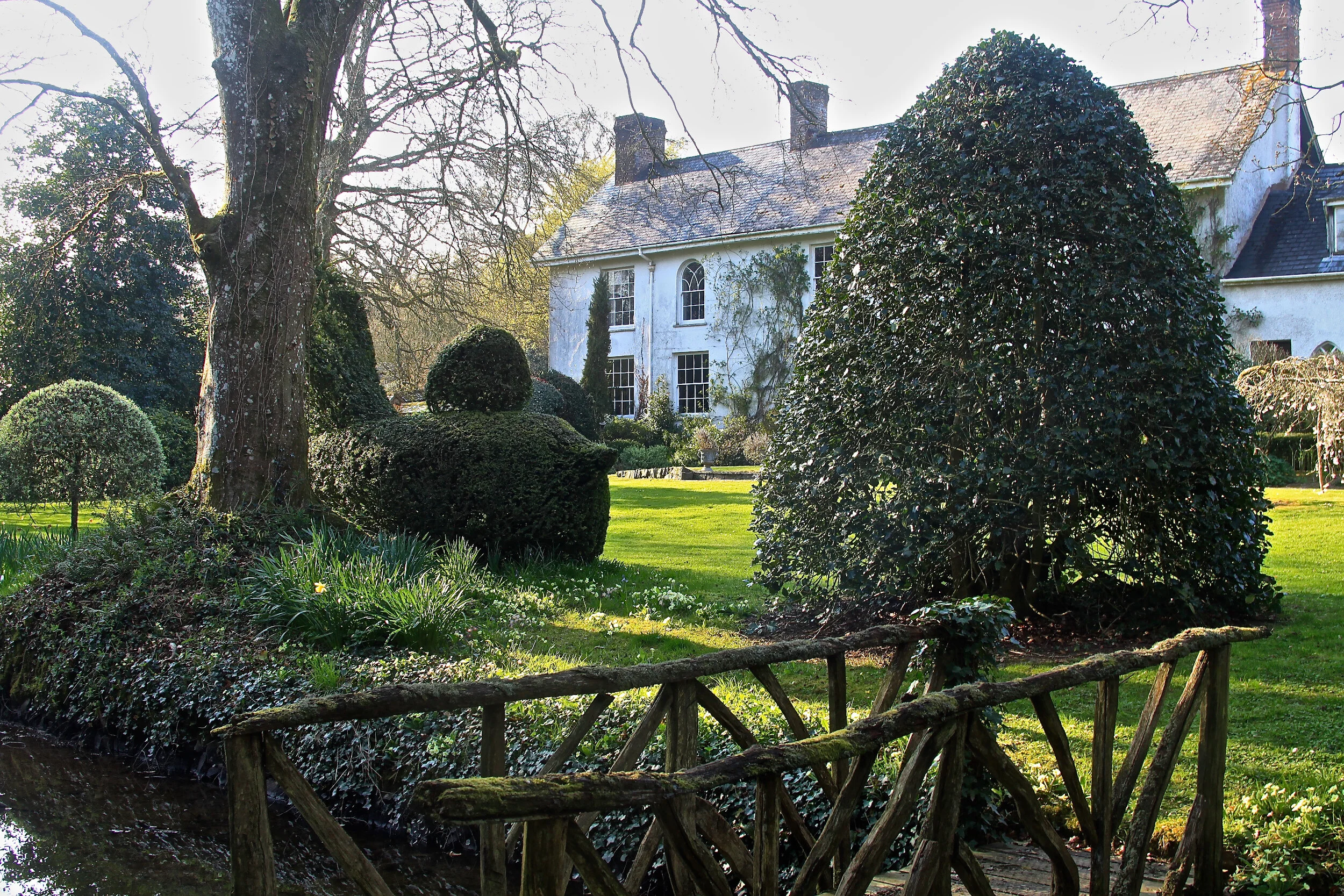 View of Coombe House across the front lawn from Mnemosyne, Plaz Metaxu