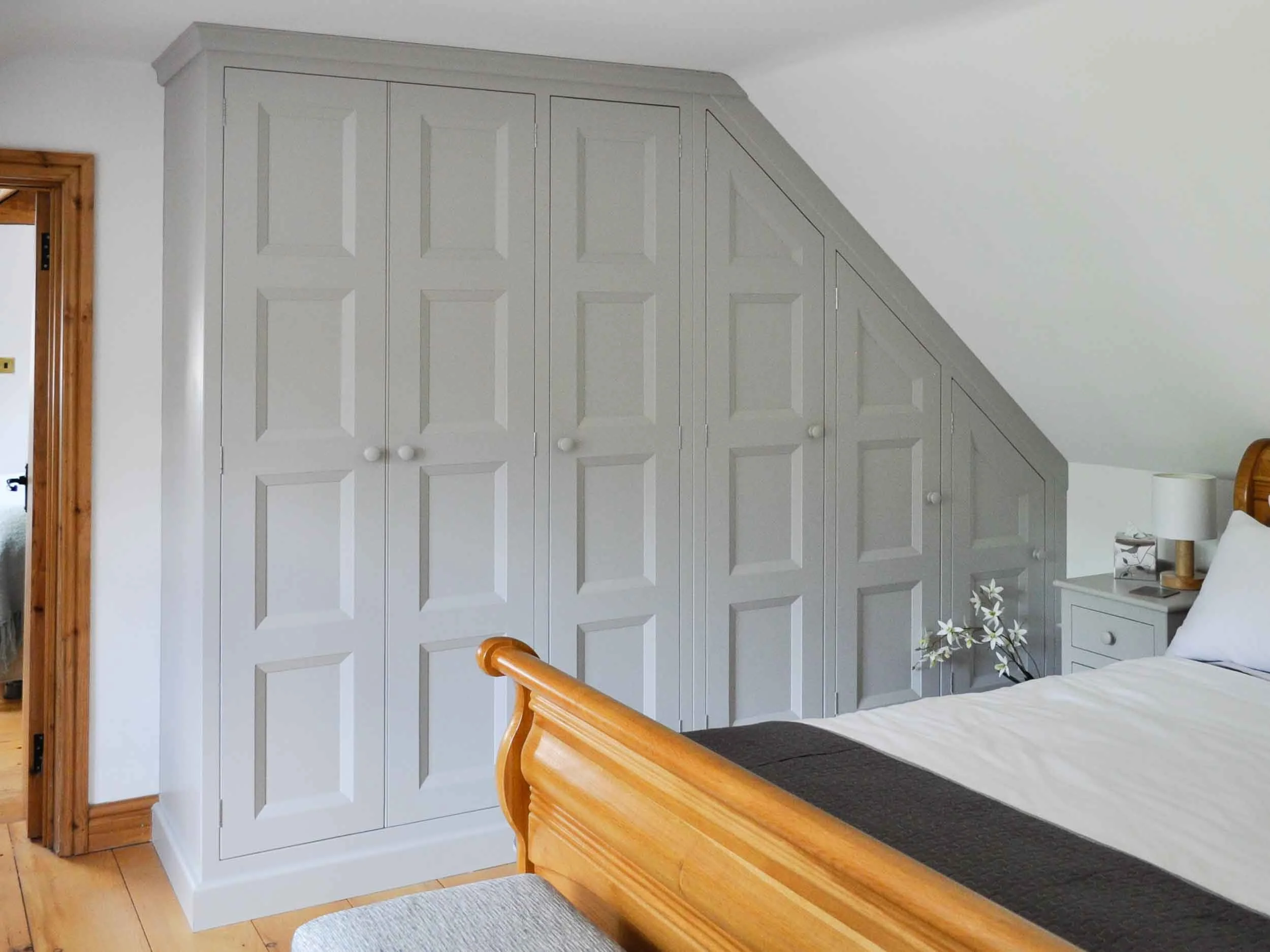 Fitted Bedroom Furniture In An Attic Room