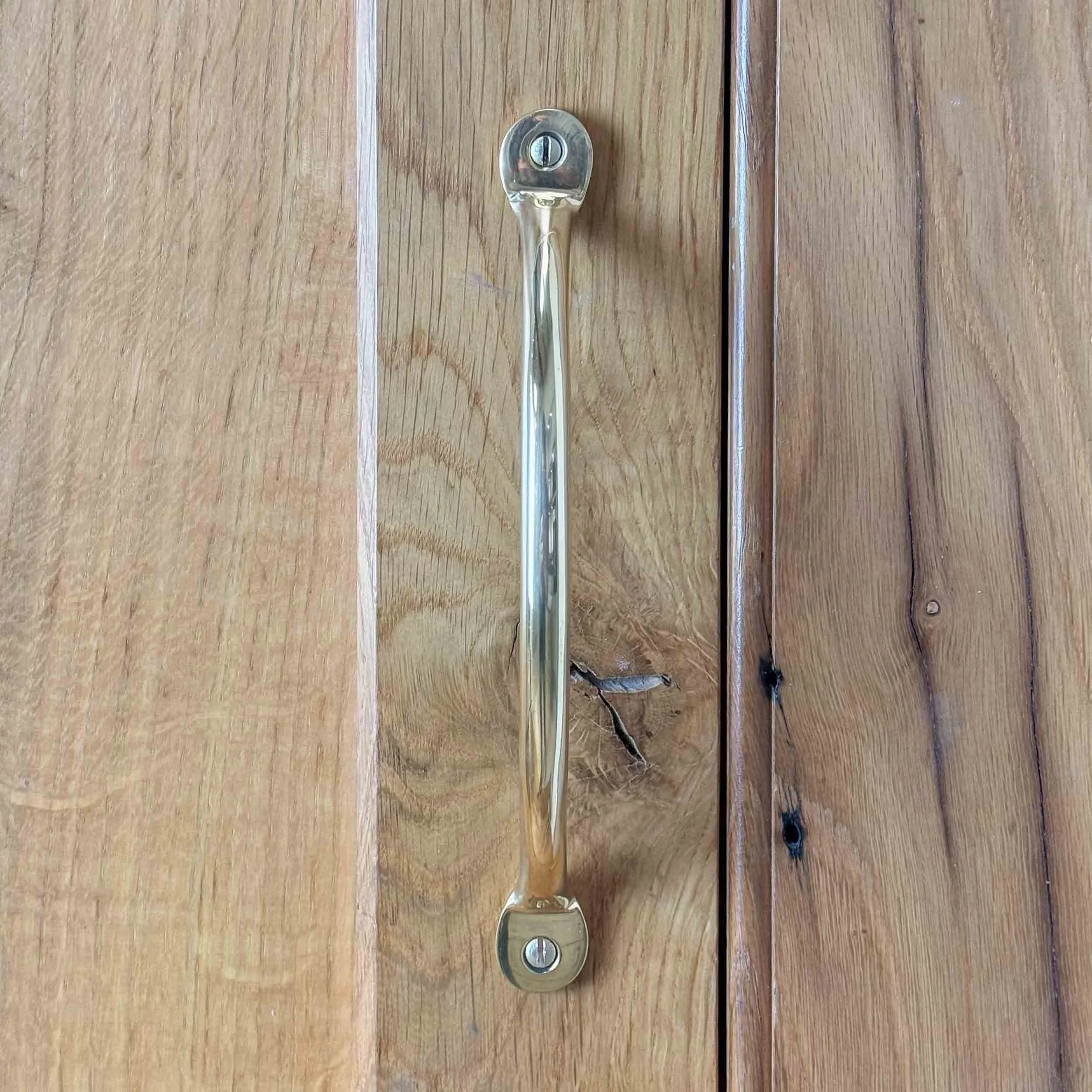 solid brass penny end bow handle for kitchens and furniture