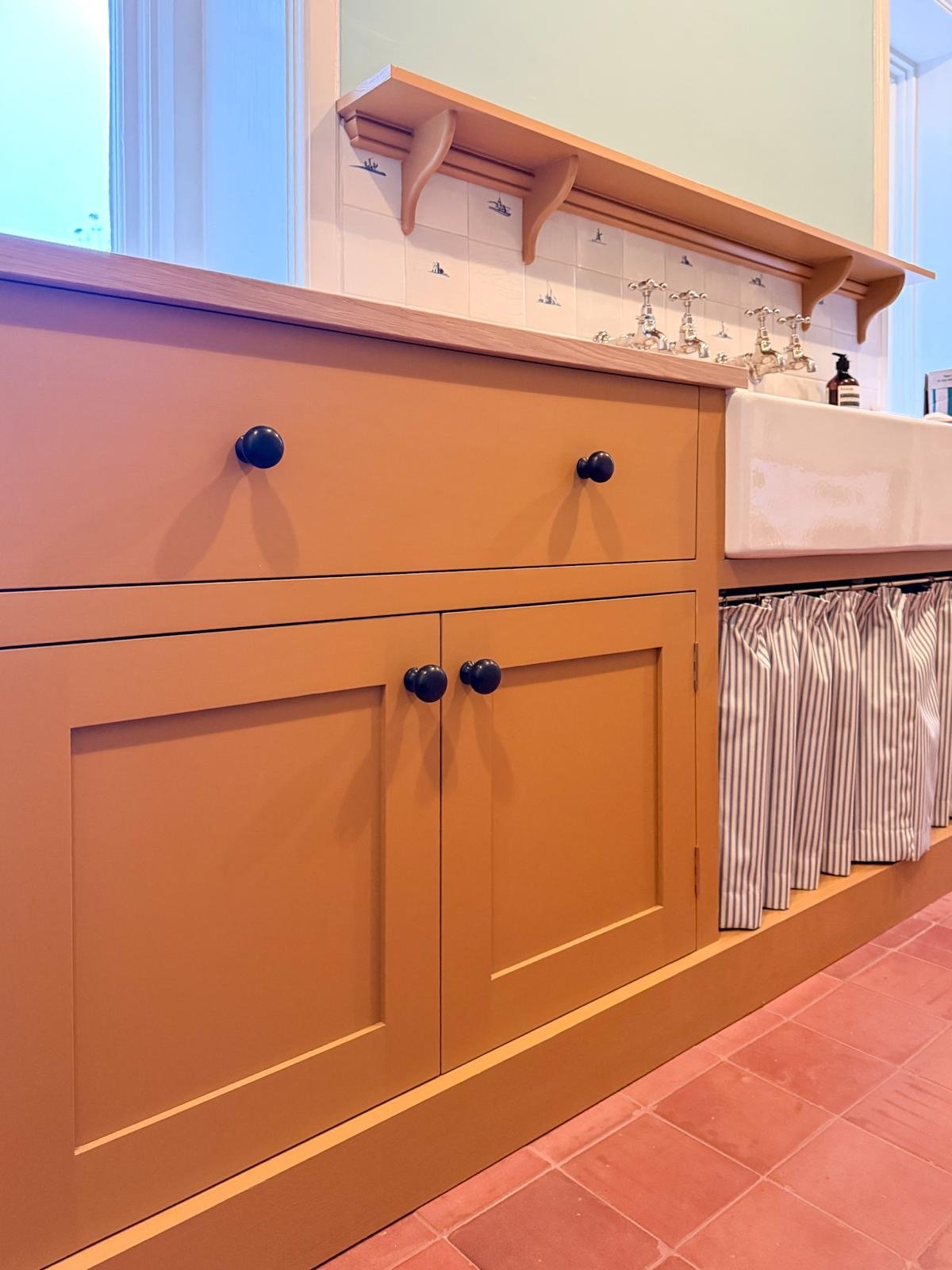 Country house laundry room cabinets