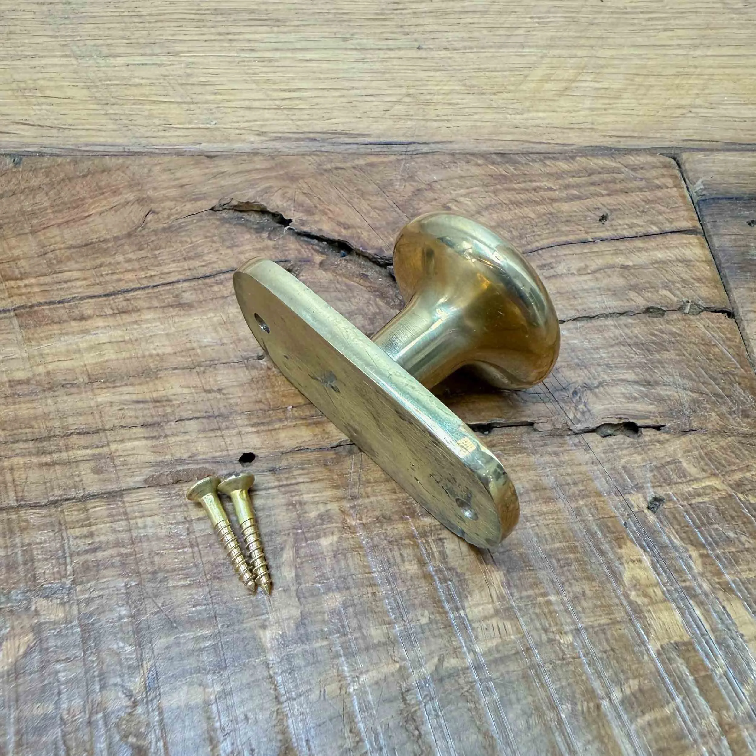 oval blackplate brass knob-8.jpg