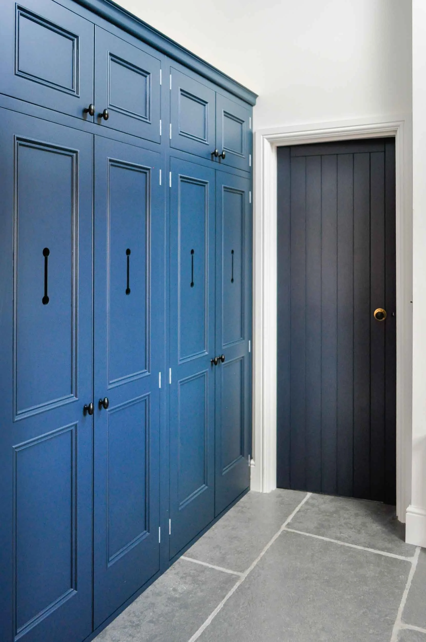 Boot room cupboards painted in F&B Hague Blue