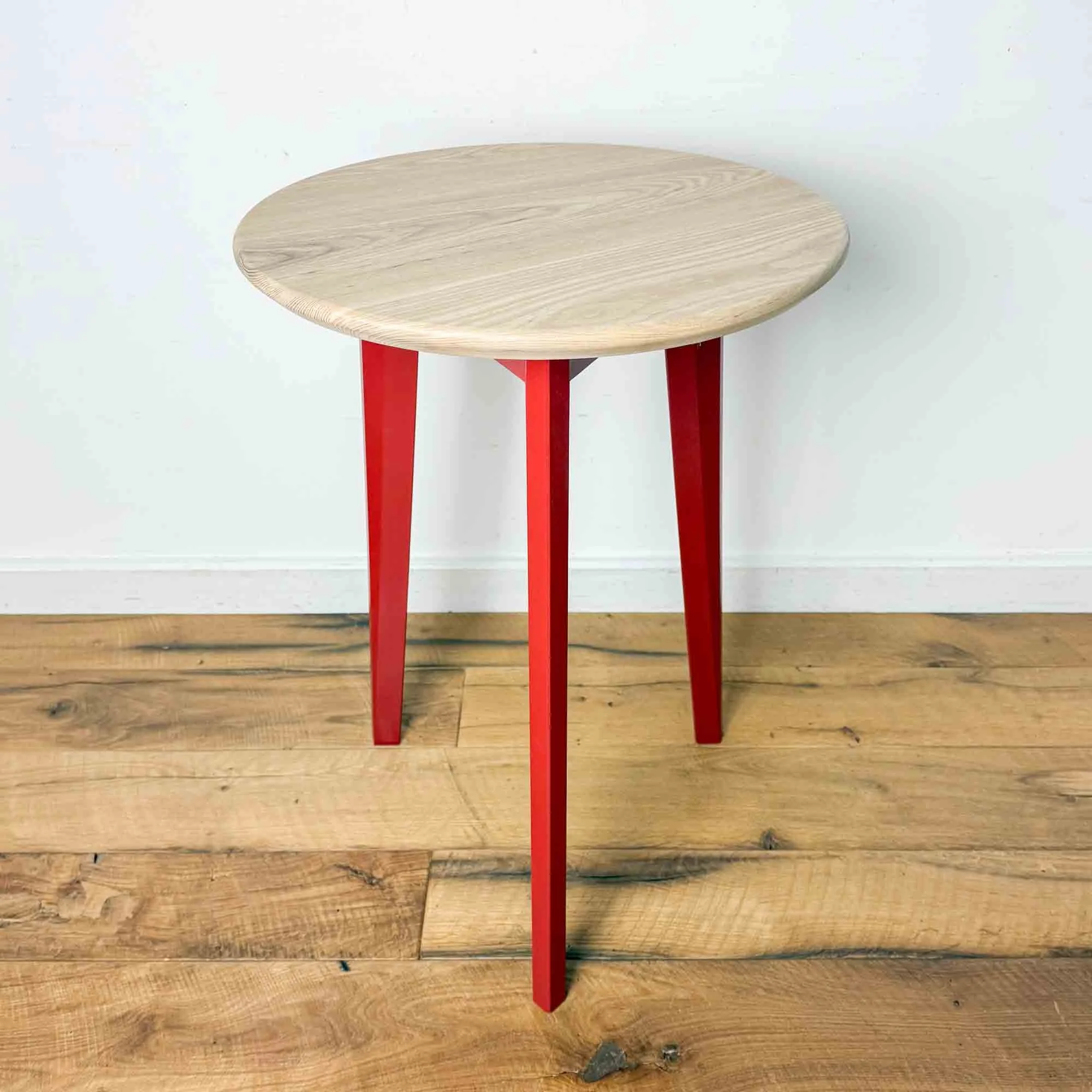 small round table painted red