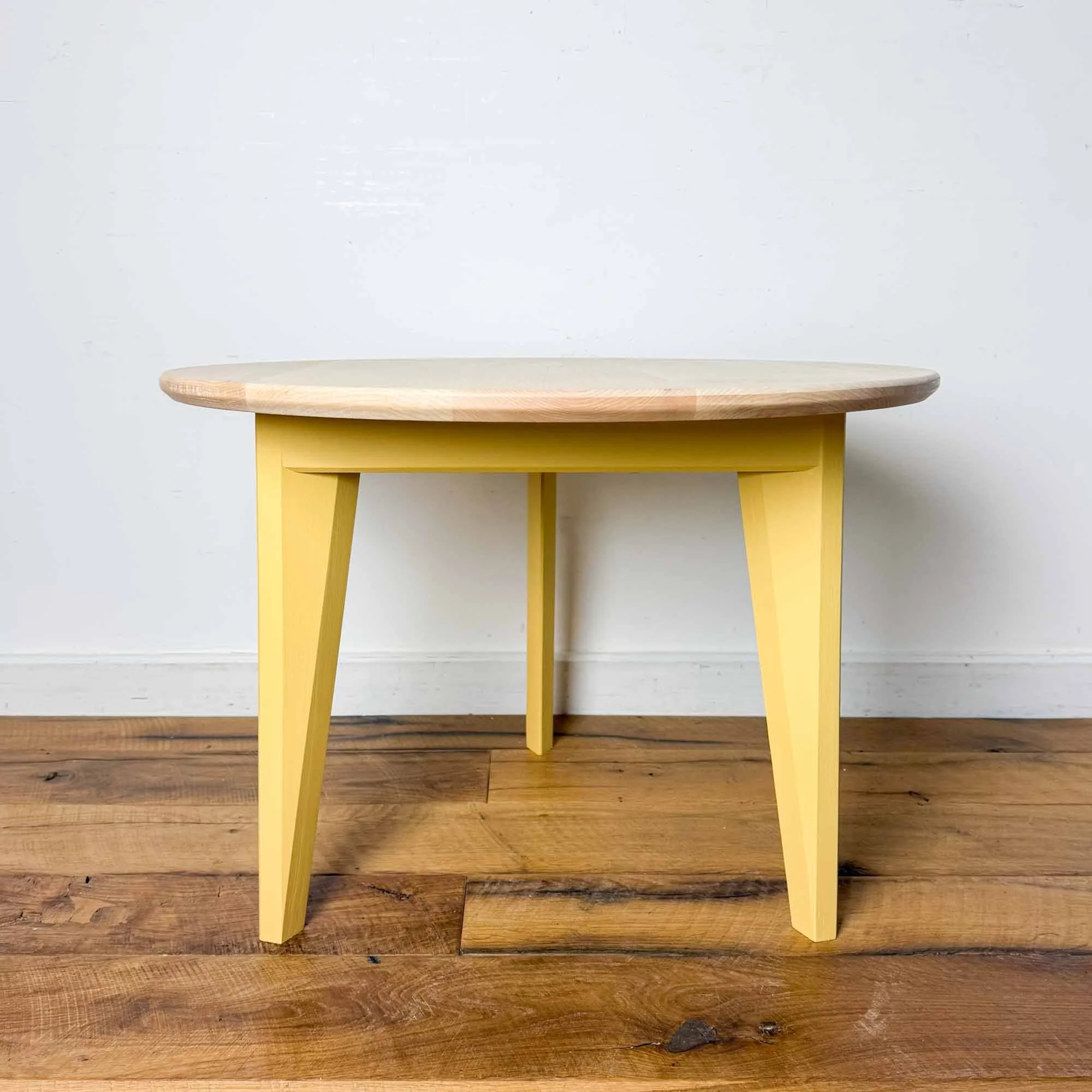 three legged round coffee table