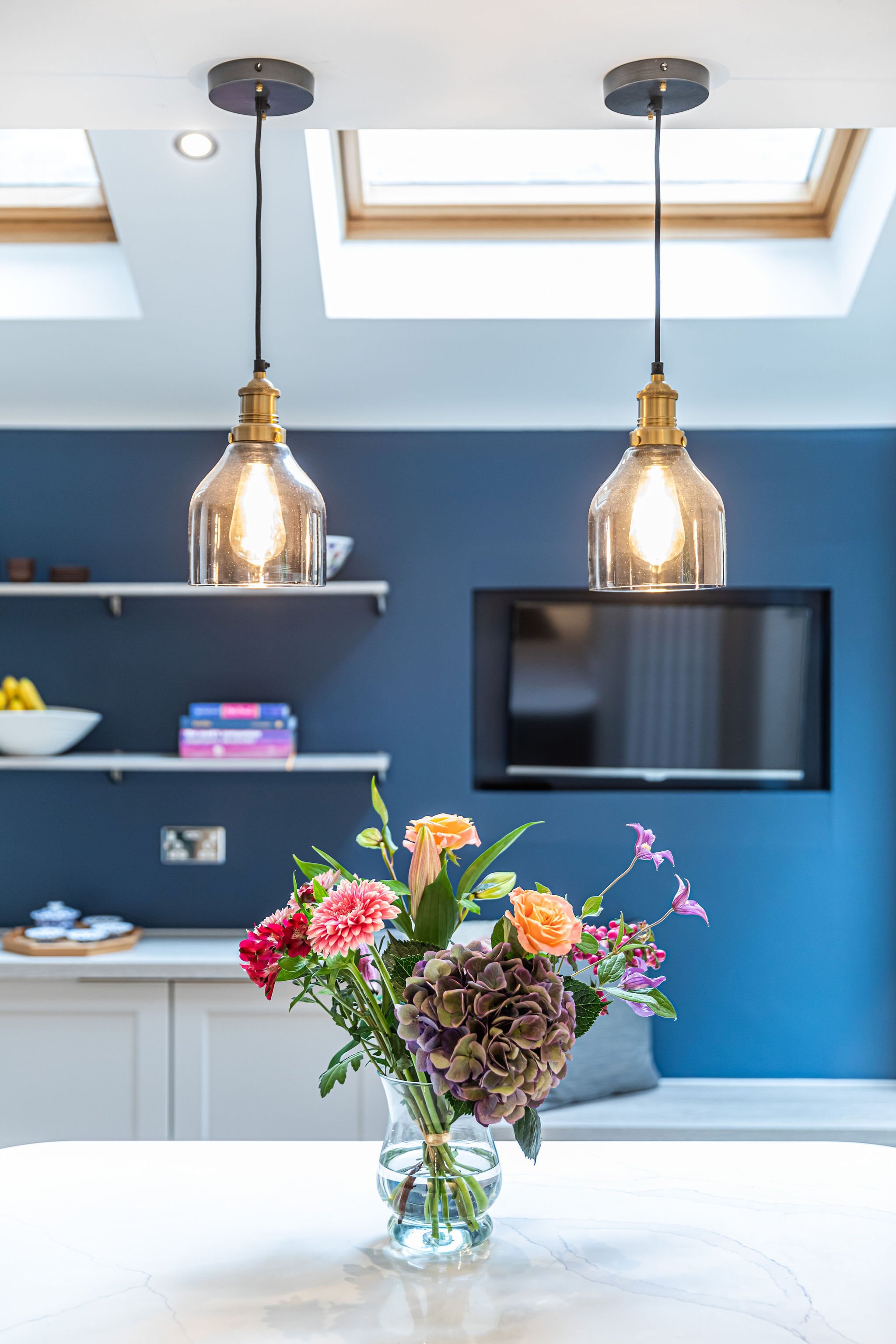 Flowers and blue wall Orsetto Interiors by Alessandra Garcia Kitchen light and bright interiors design.jpg