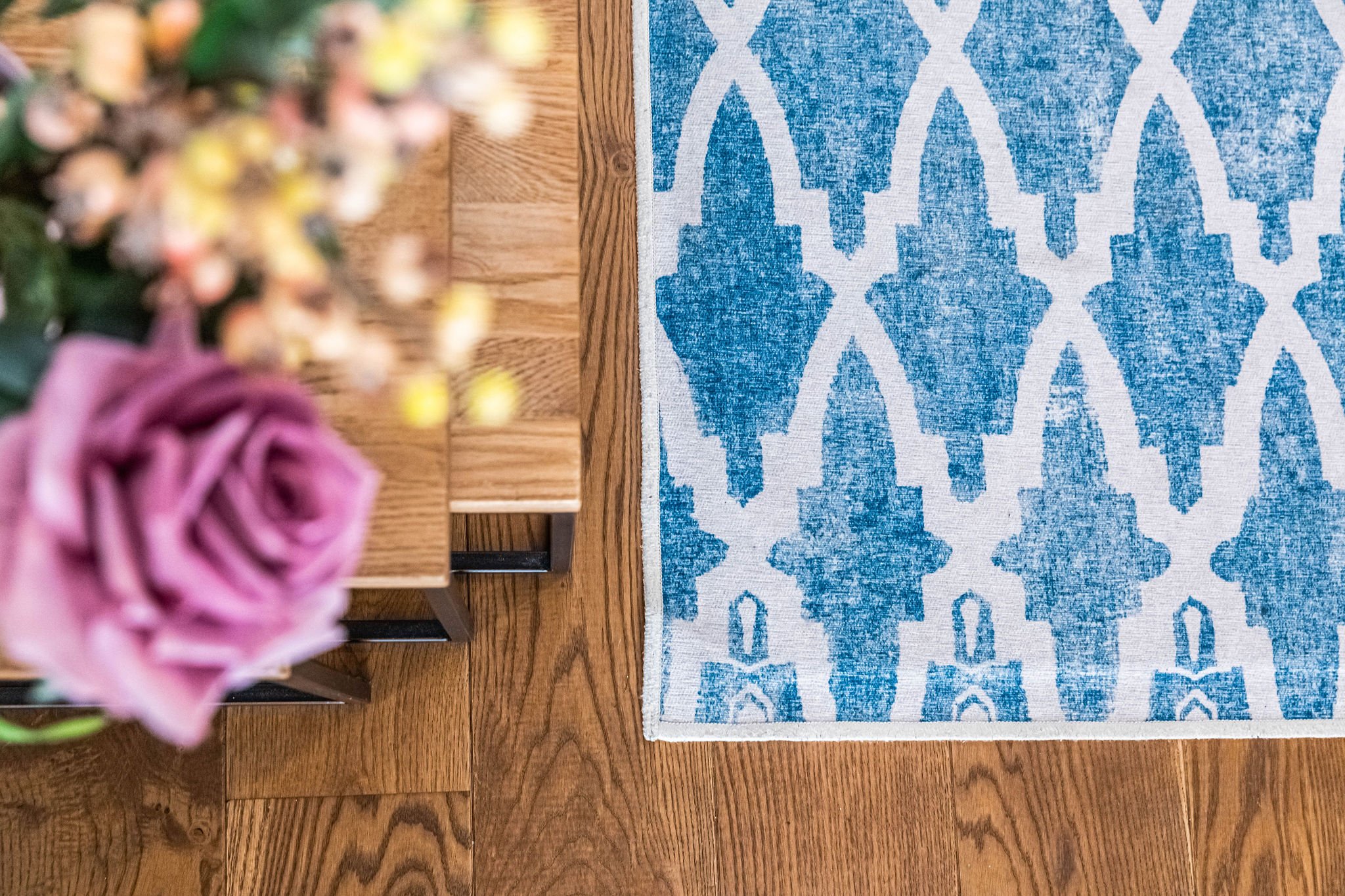 Blue and white pattern rug with flowers .jpg
