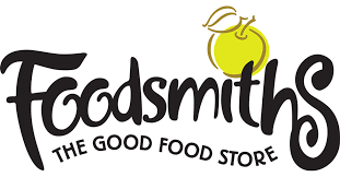 Logo for Foodsmiths, a grocery store, with the tagline "The Good Food Store" and a green apple with a leaf.