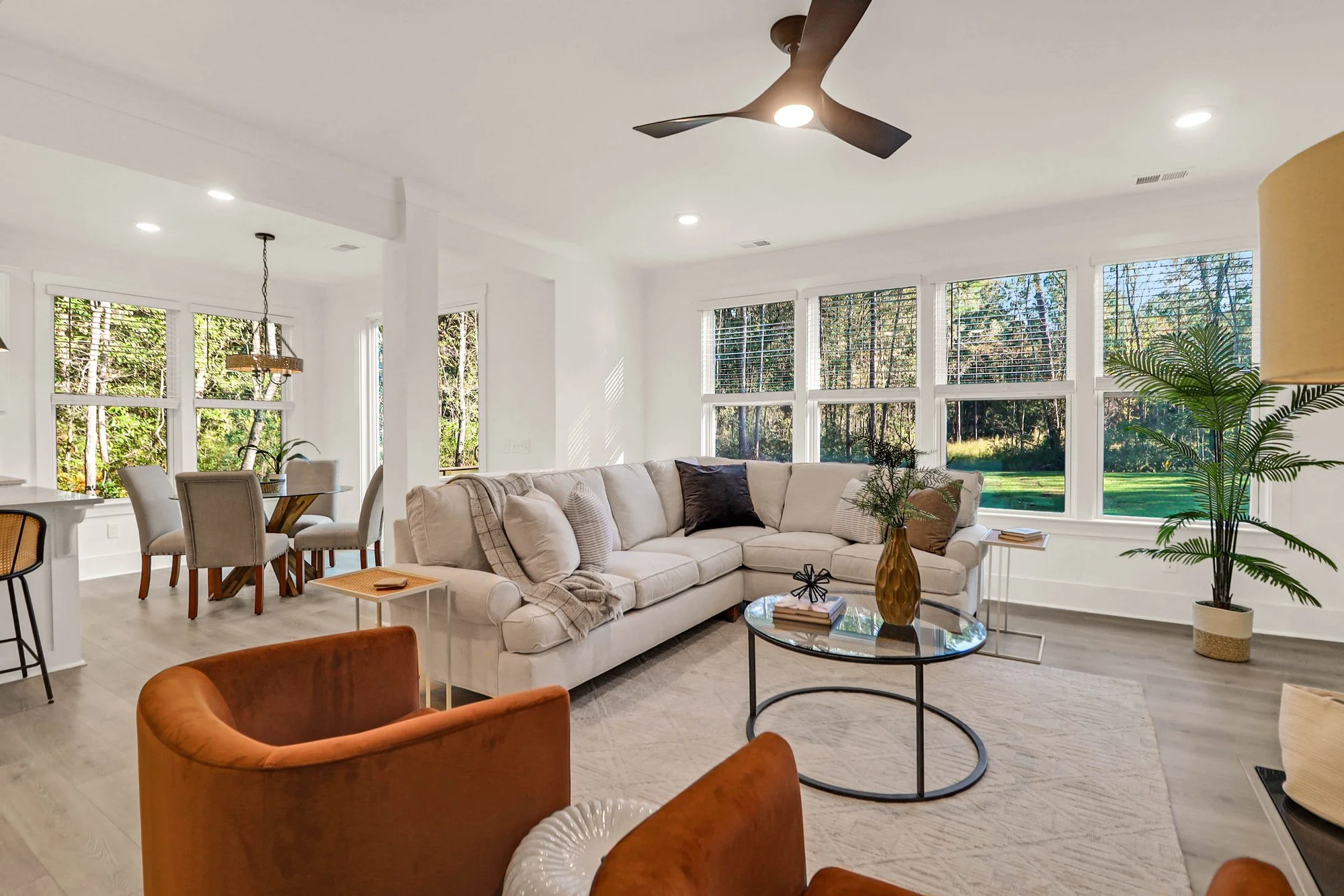 sectional, chairs, styled coffee table - living room staging charleston