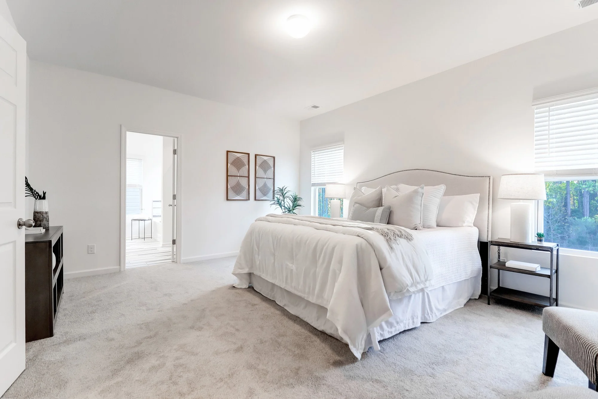 bedroom with dresser, comfy bedding, nightstands - Staging a Bedroom, charleston, SC