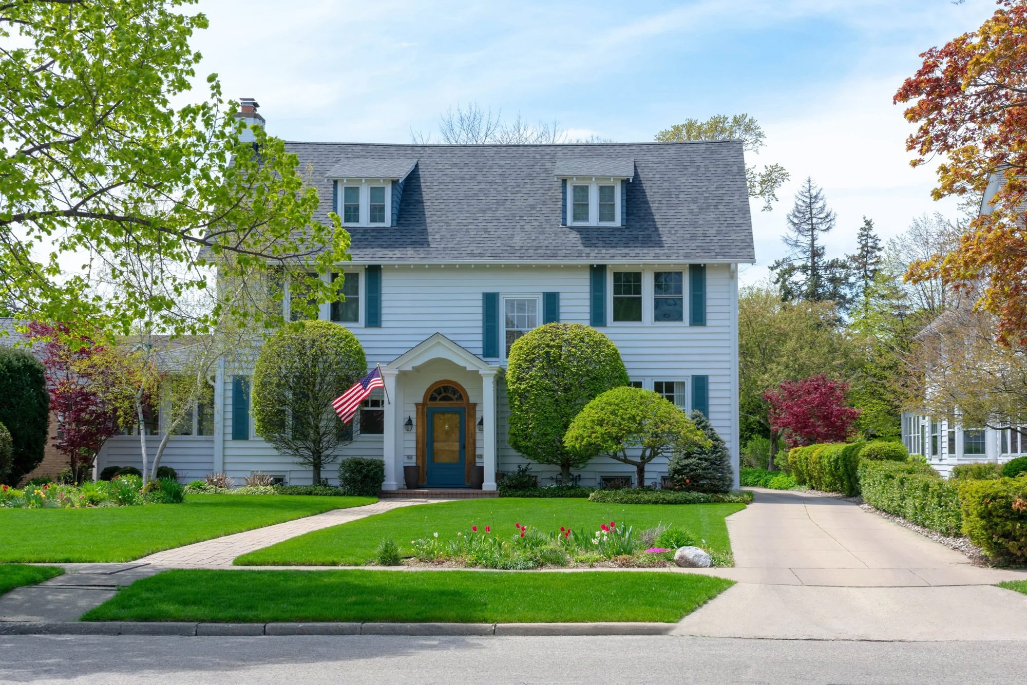 beautiful white home with gorgeous yard - curb appeal ideas