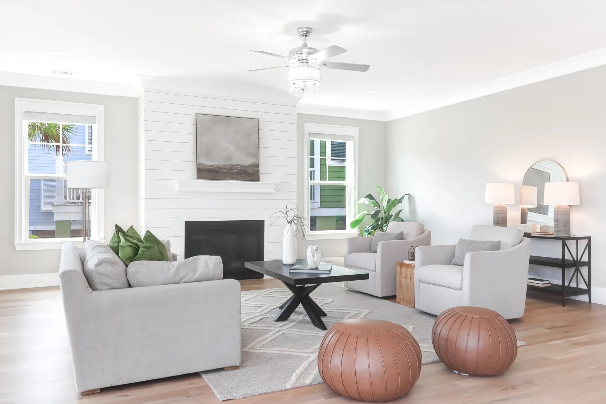 couches, bean bag seats and cofffee table - living room staging charleston