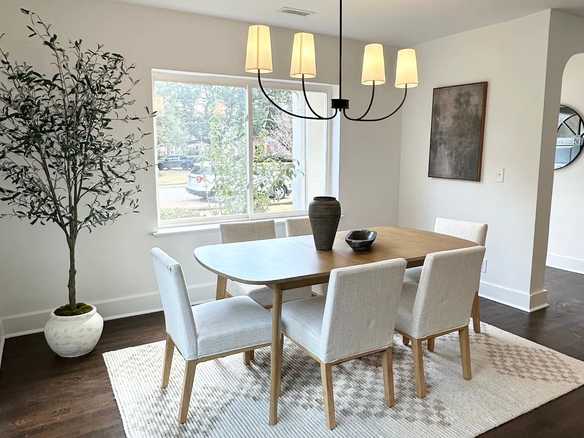 dining room with table and plant - staging a dining room