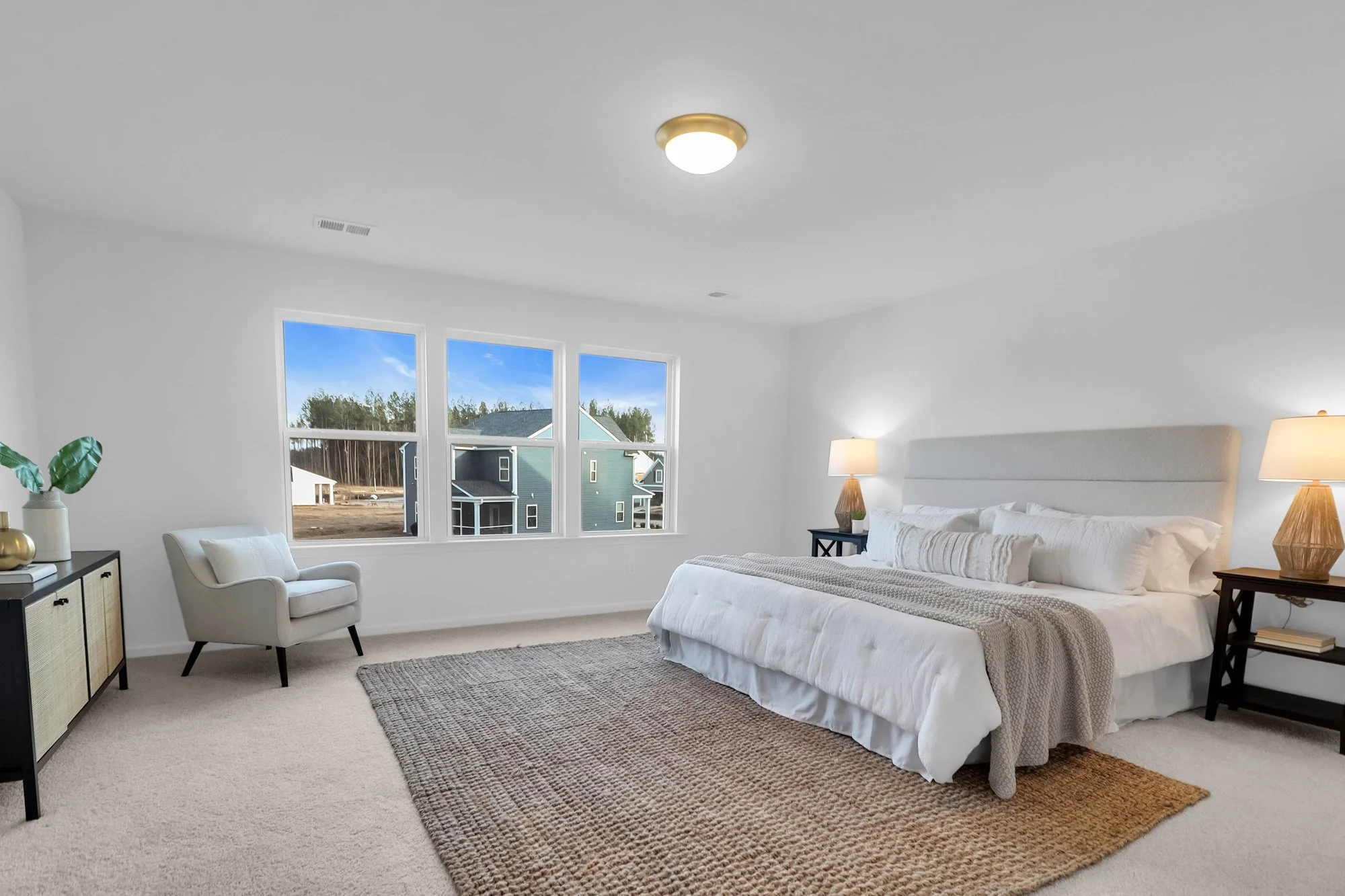 bed, nightstand and lamps