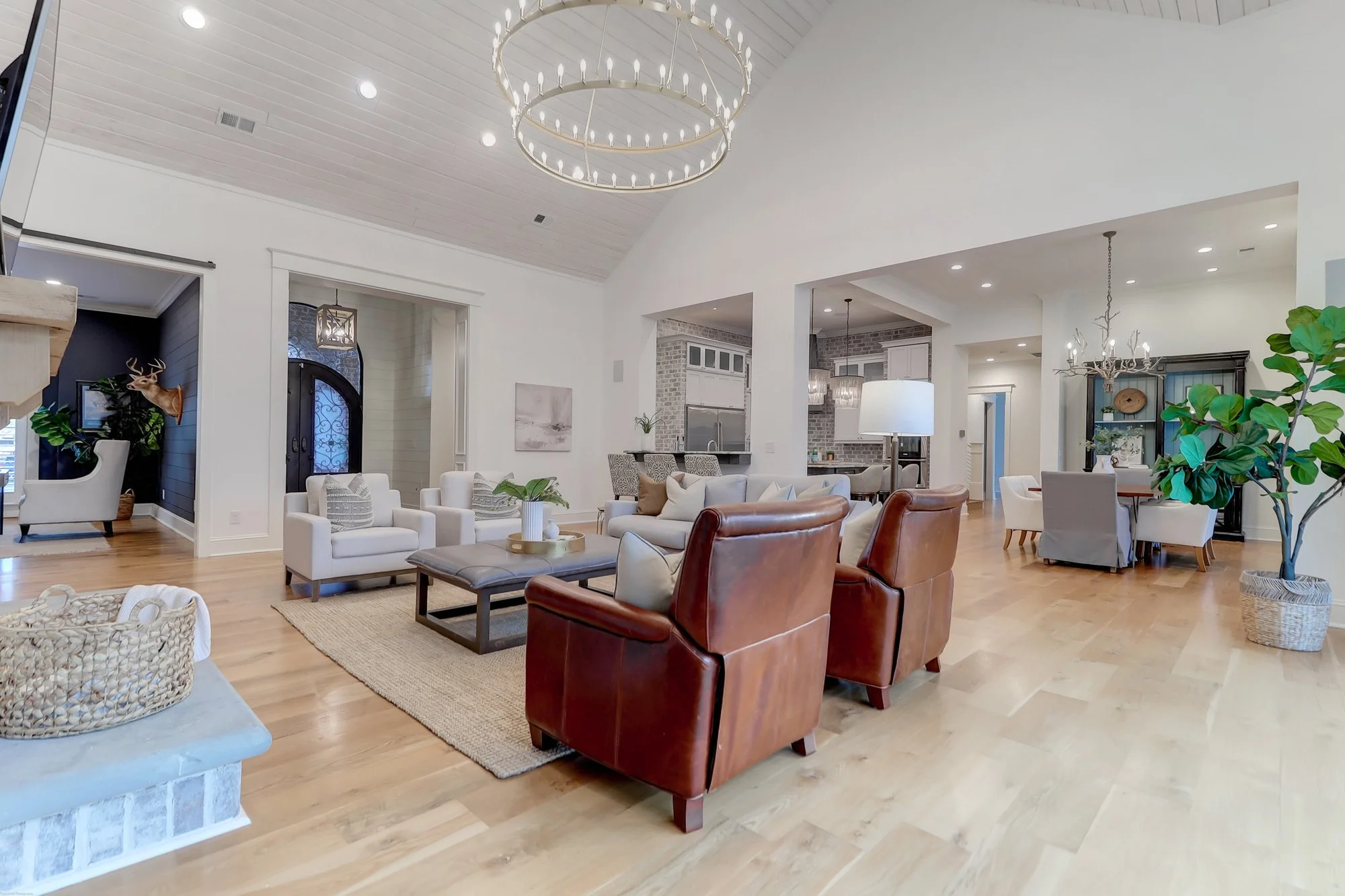 huge living room with chairs, sofa and coffee table - living room staging charleston