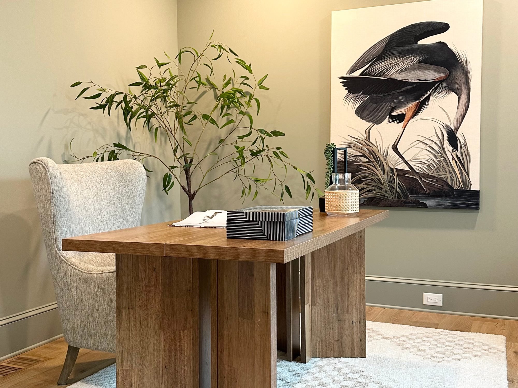 home office with art work and desk
