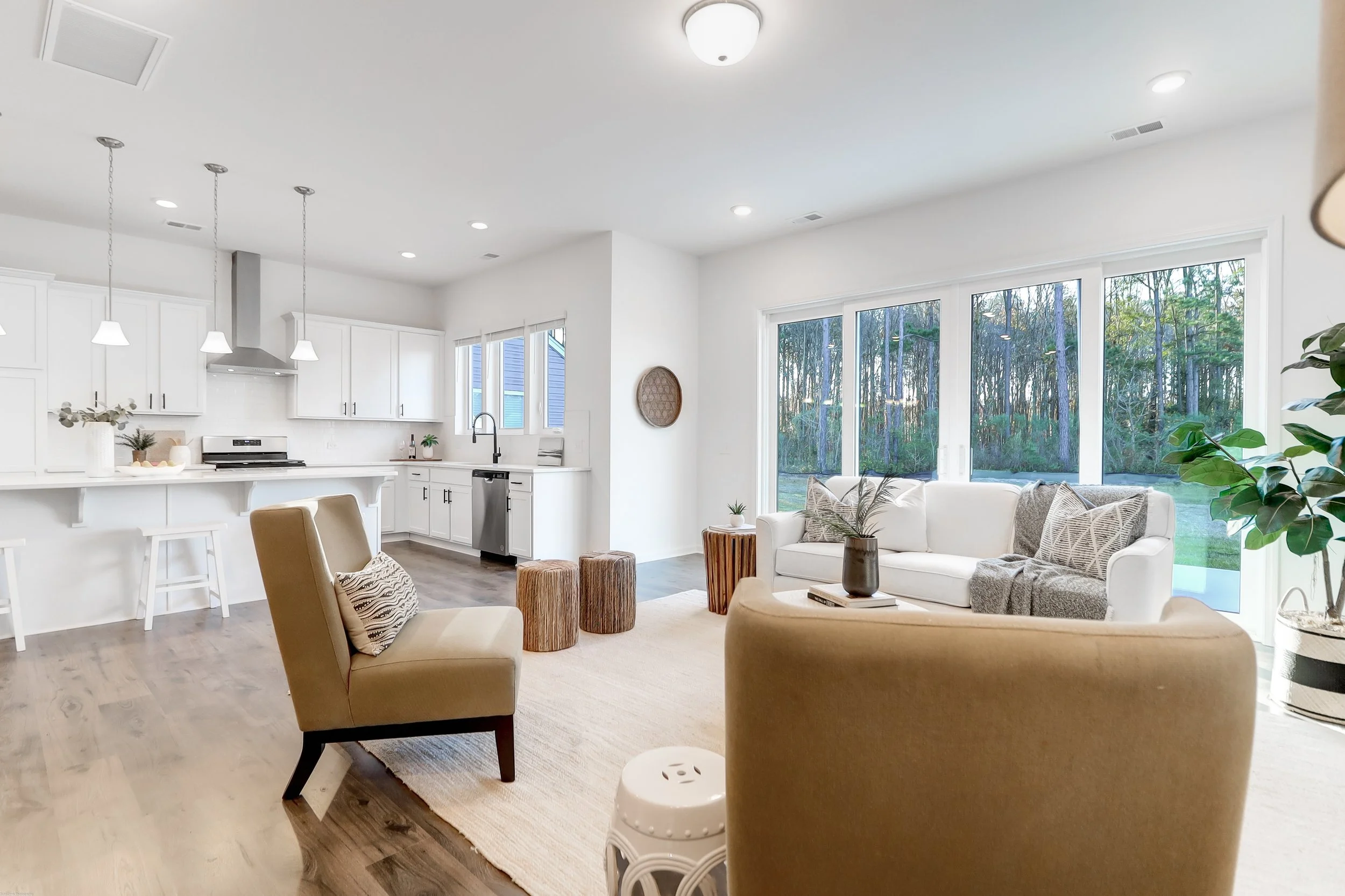 living room setup with couch and chairs