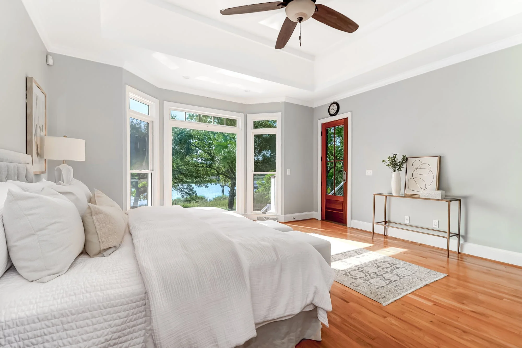 primary bedroom with cozy blankets and pillows