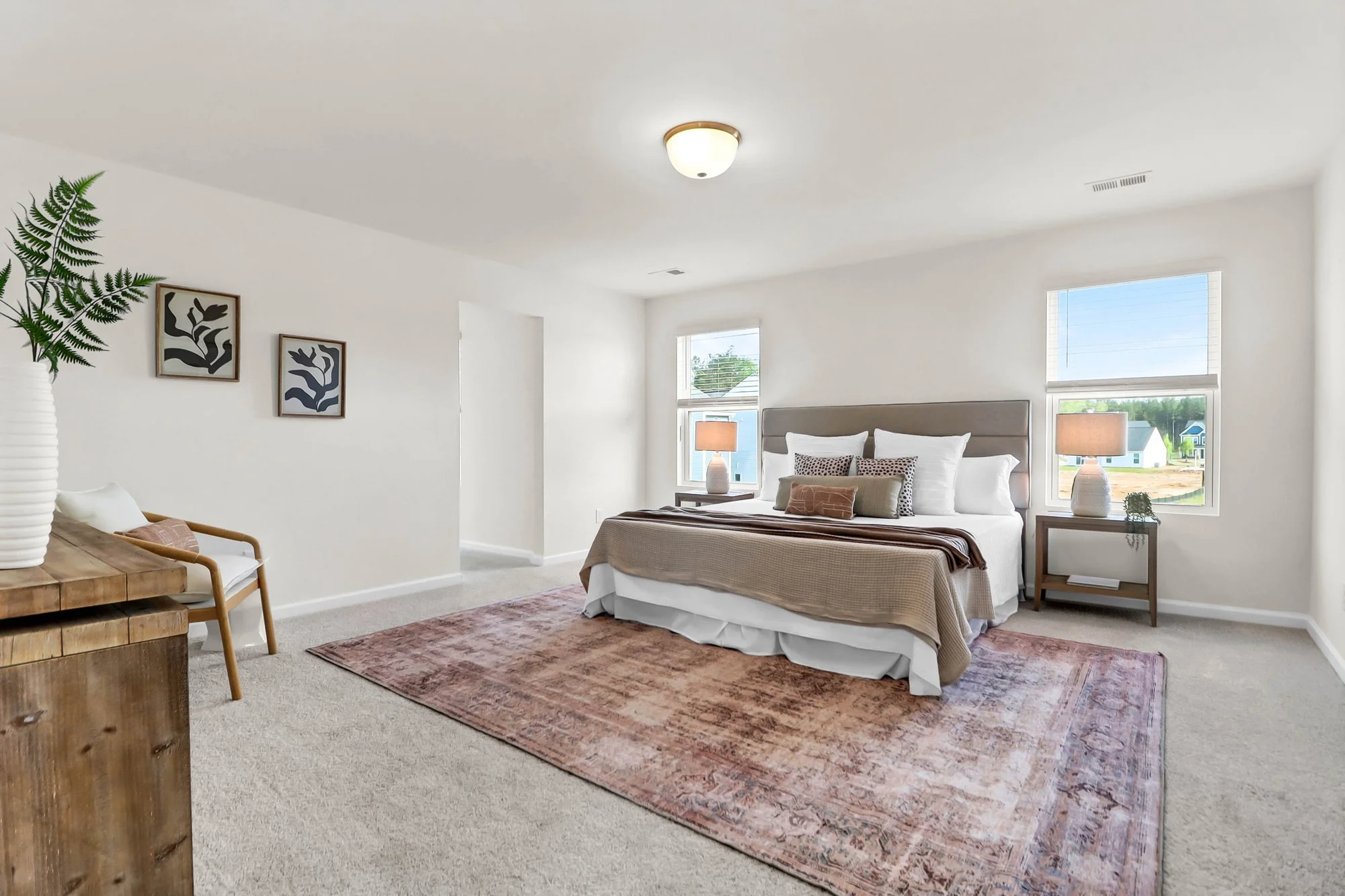 large open bedroom, dresser and bedding on bed - Staging a Bedroom, charleston, SC