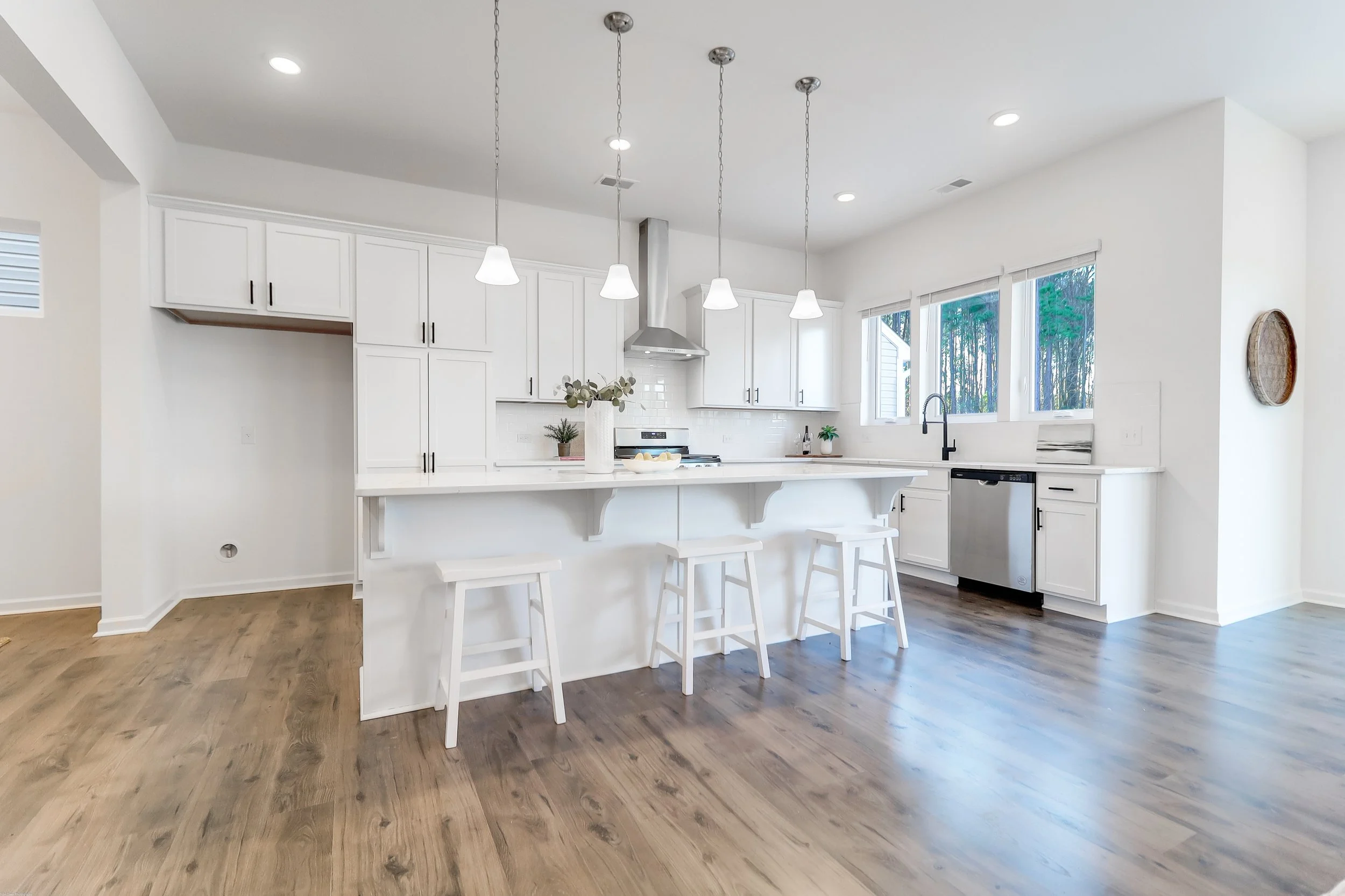 white stools and white kitchen - Deep Clean Checklist