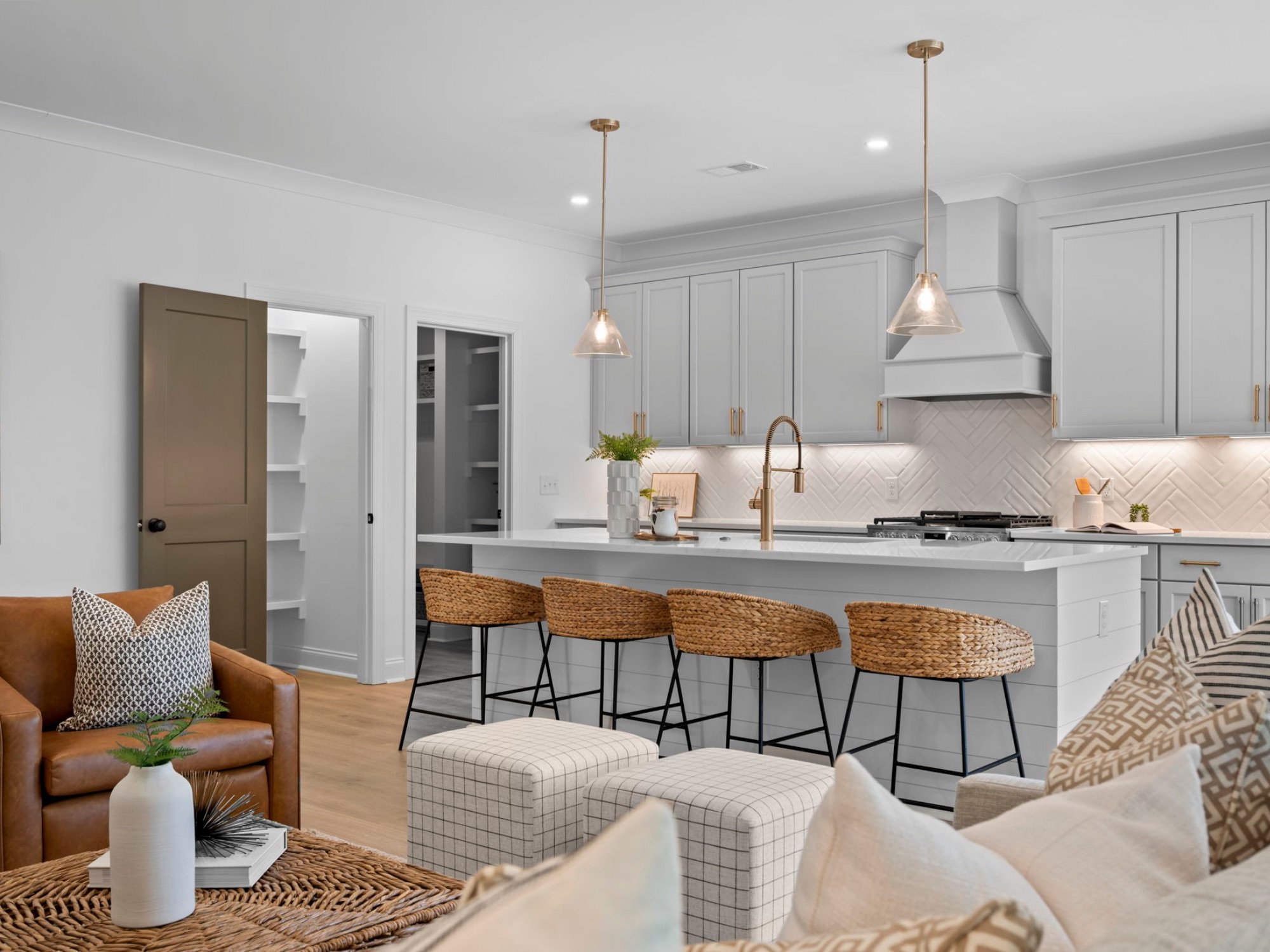 living room with table, chairs and couch - benefits of home staging