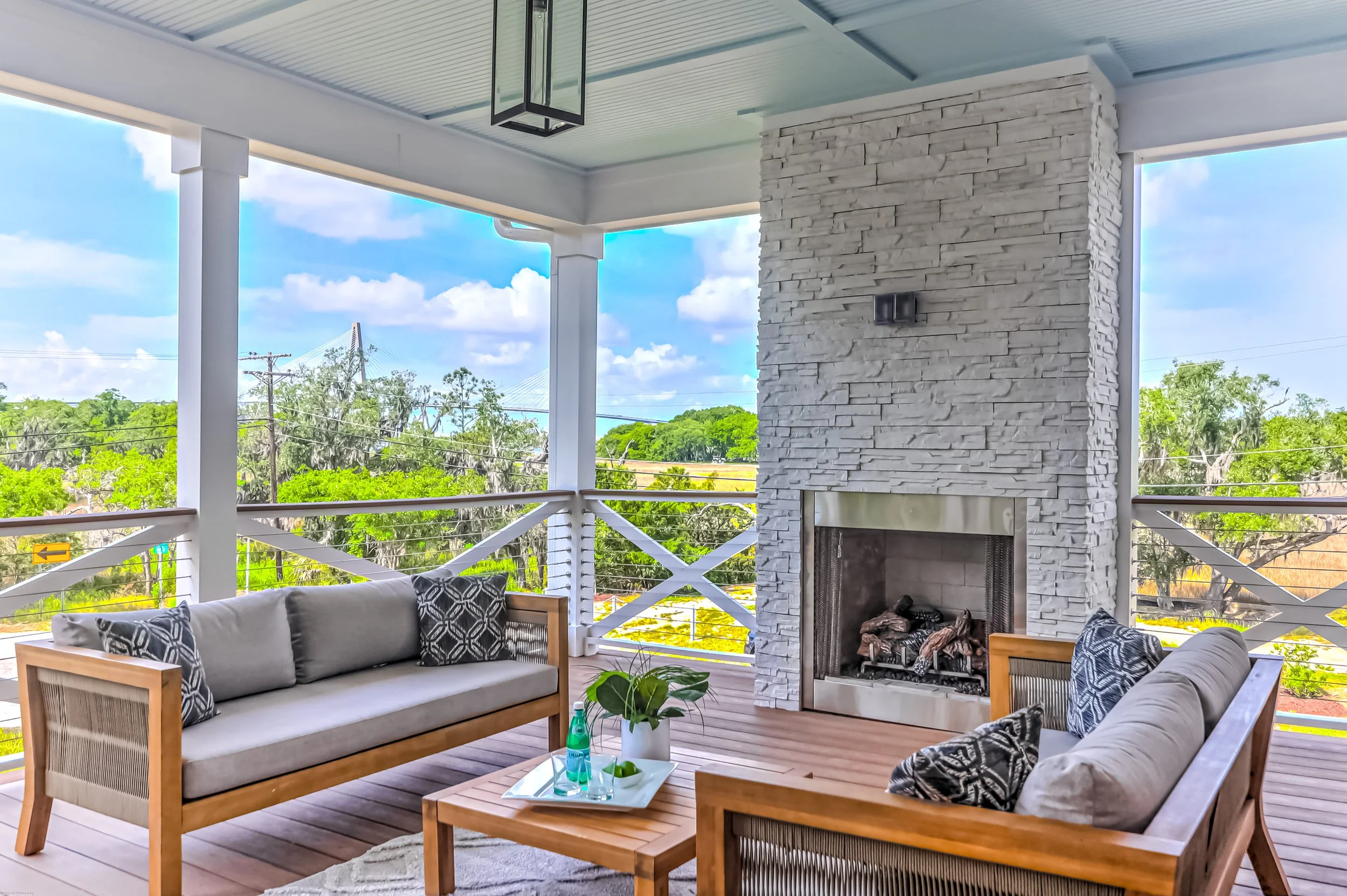 outdoor front porch with couches and table