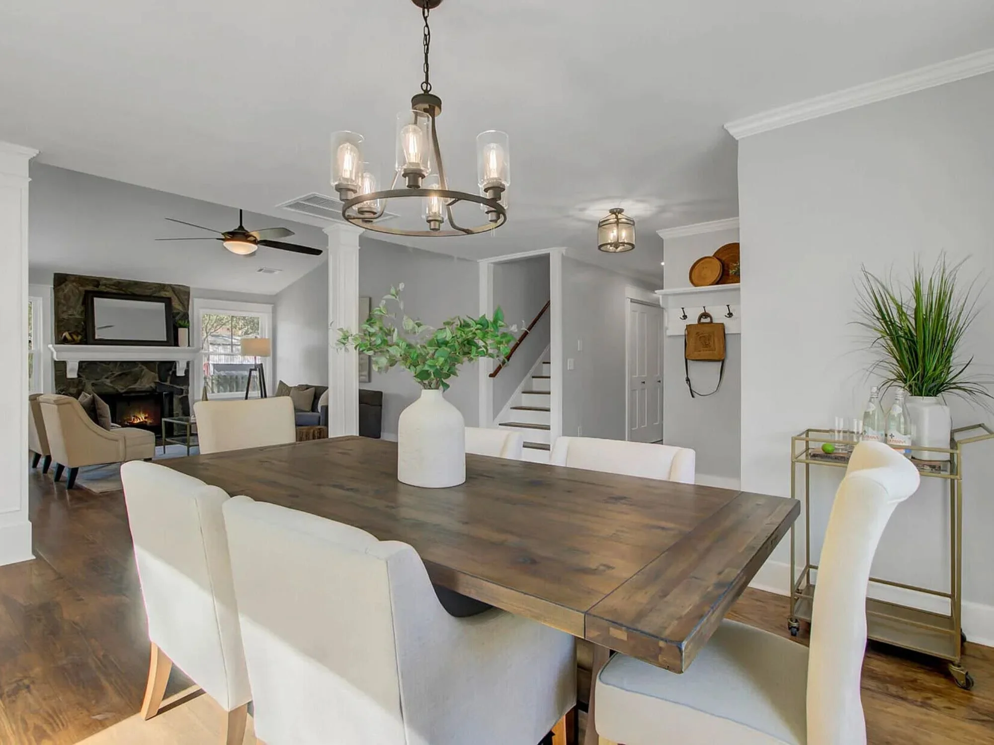 dining table and chairs with bar cart - staging a dining room