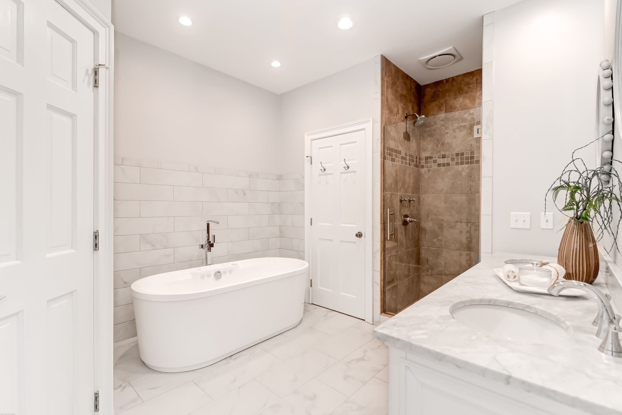 garden tub and tray with towels in bathroom - home staging tips charleston, SC