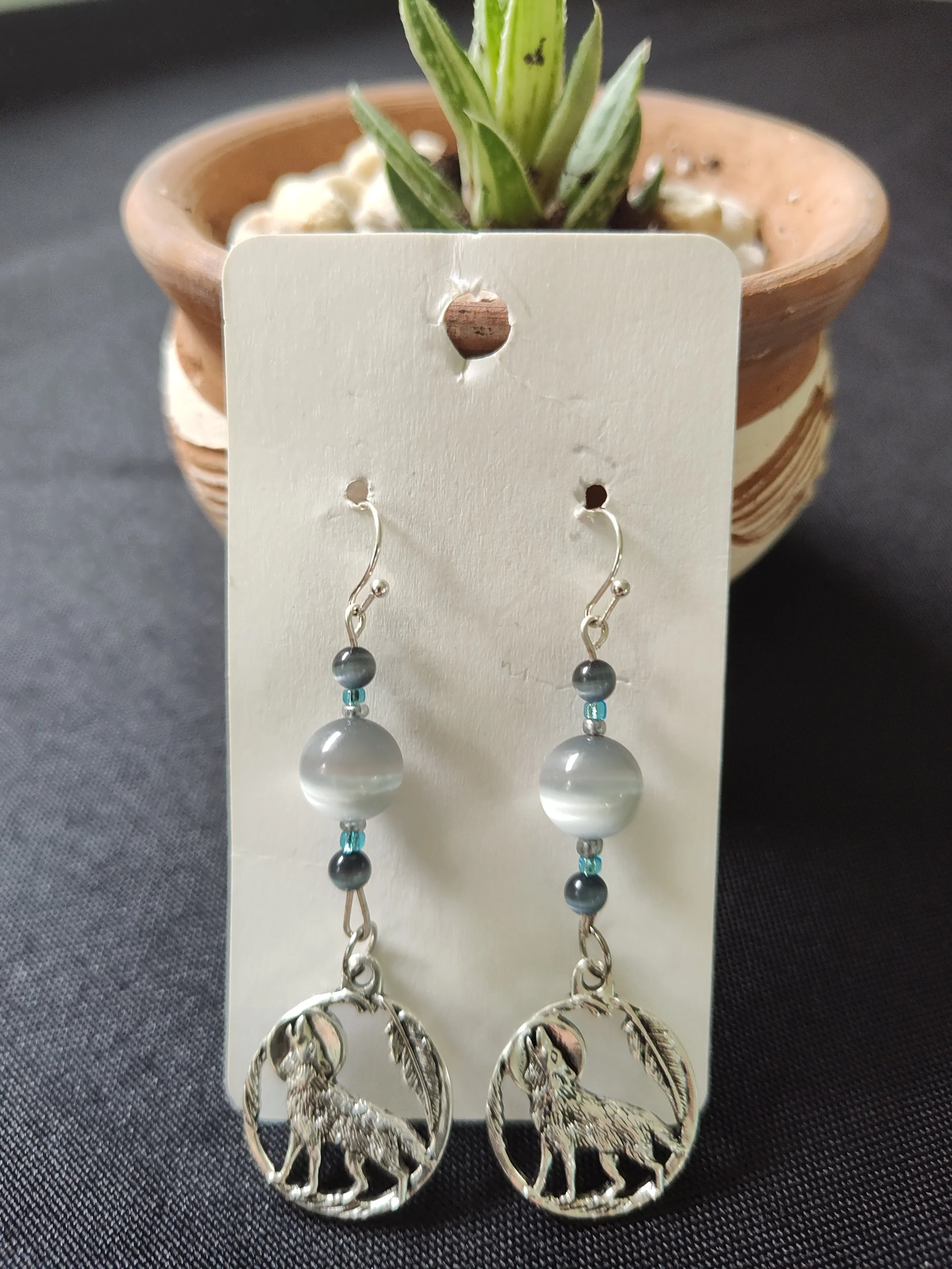WOLF-EYE MOONSTONE WITH WOLF CHARM.jpg